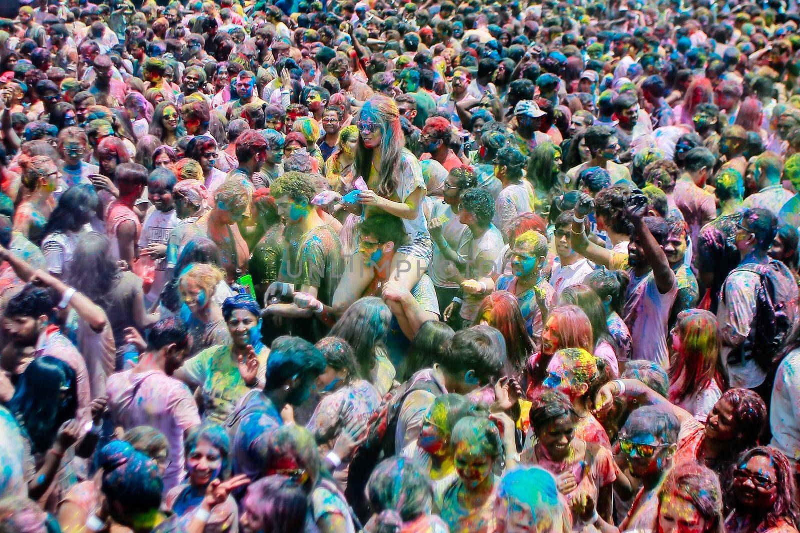 MALAYSIA, Kuala Lumpur: Revellers dance and spray colored powder during the Holi Festival in Kuala Lumpur on March 26, 2016. Holi, also called the Festival of Colours, is a popular Hindu spring festival observed in India, Malaysia and other countries at the end of the winter season on the last full moon day of the lunar month. 