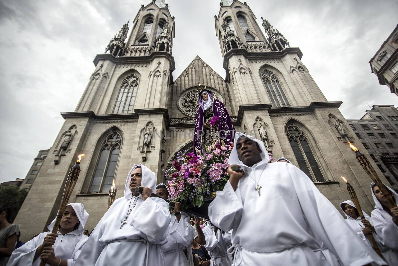 BRAZIL, Sao Paulo: Worshippers carry a statue of The Virgin Mary, as part of a Good Friday procession through Sao Paulo, Brazil on March 25, 2016.Good Friday is the Friday before Easter, which symbolizes the day that Jesus Christ was crucified and died.