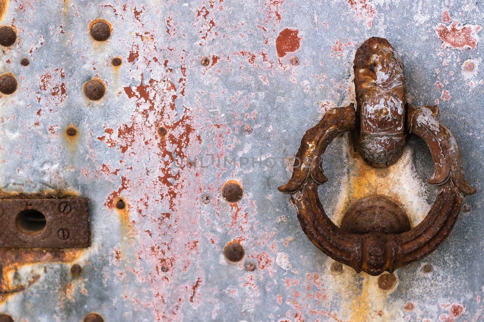 Close up of rustic old door in Sicily - Italy.