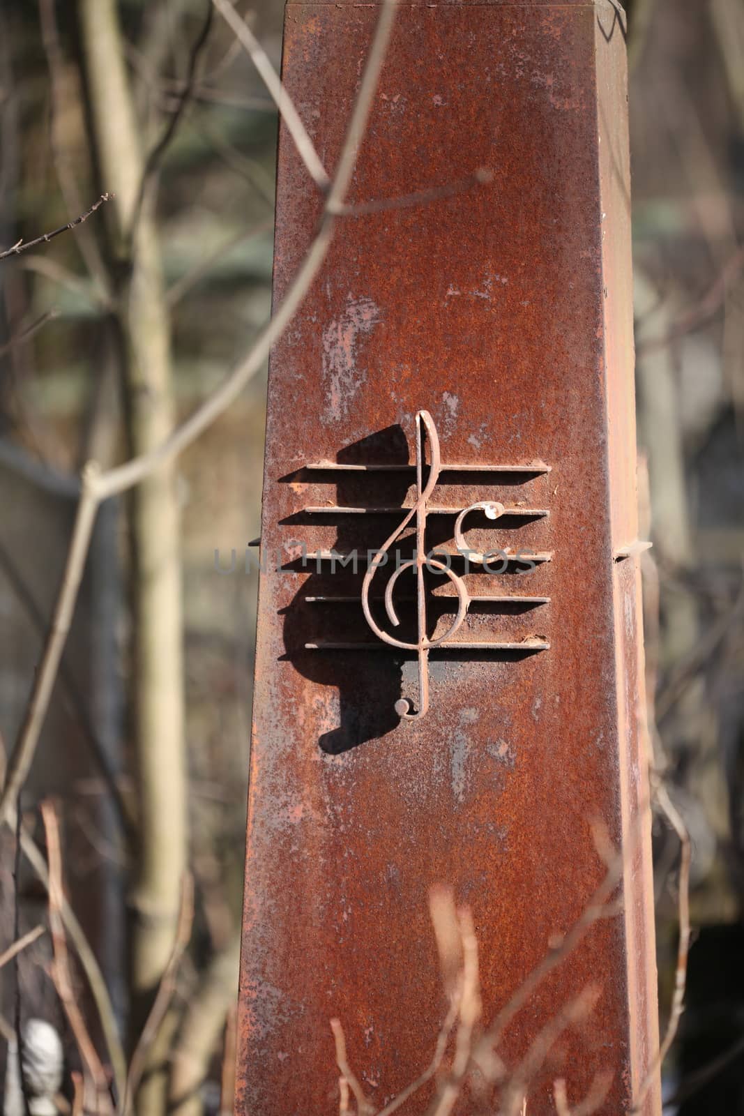 Iron treble clef musician monument