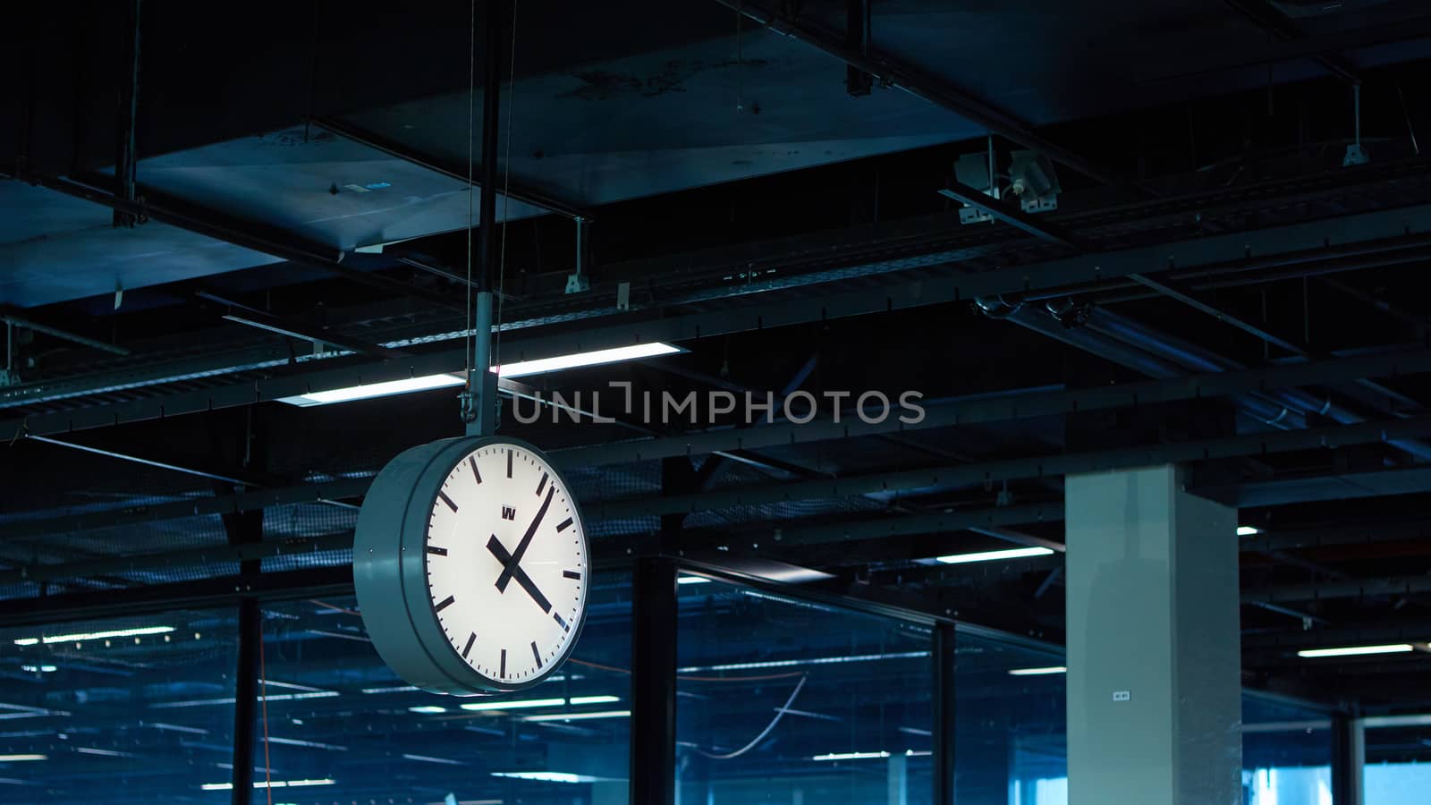 Amsterdam, Netherlands - March 11, 2016: Amsterdam Airport Schiphol in Netherlands. The clock in terminal