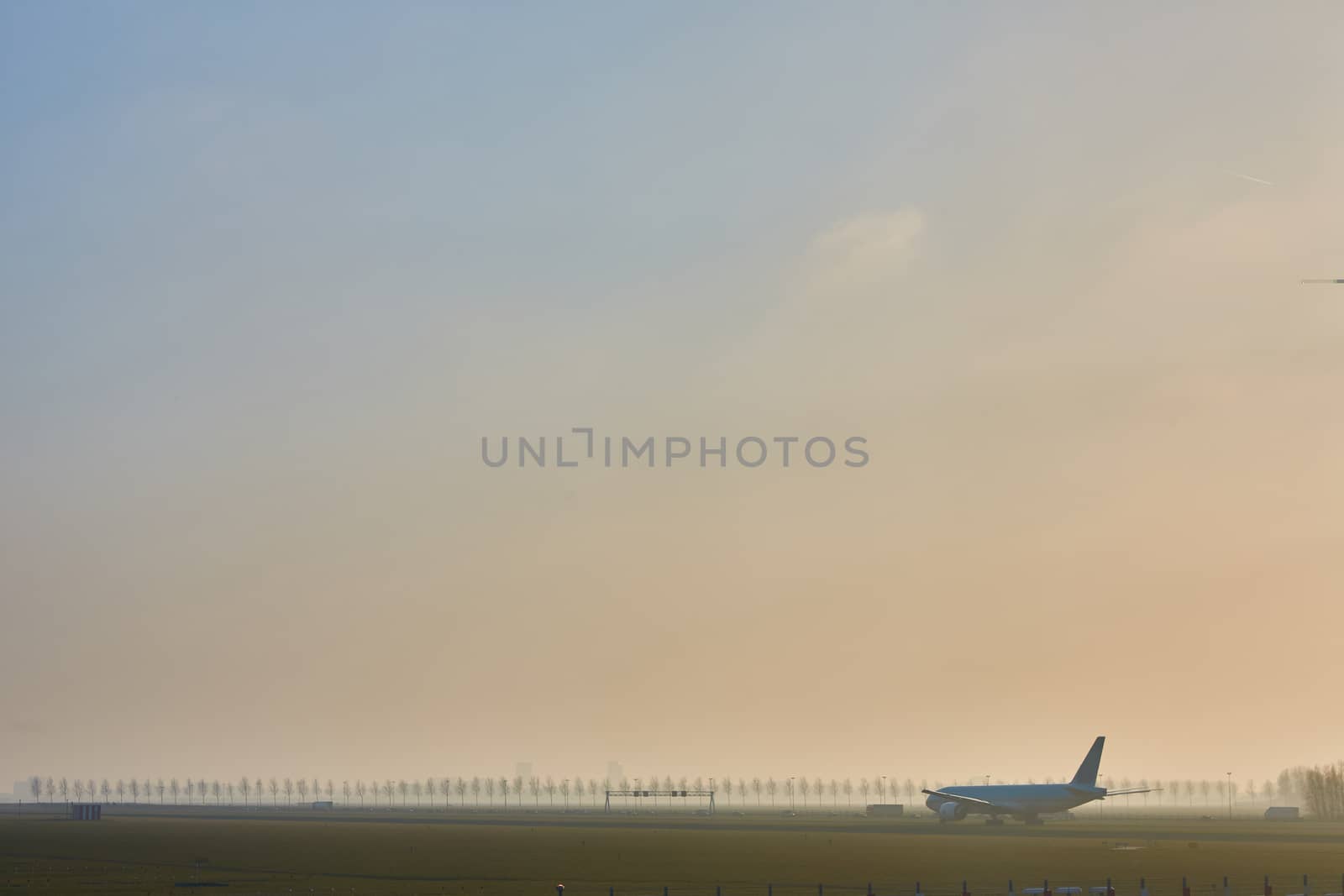 Airplane departing from Airport Schiphol. by sarymsakov