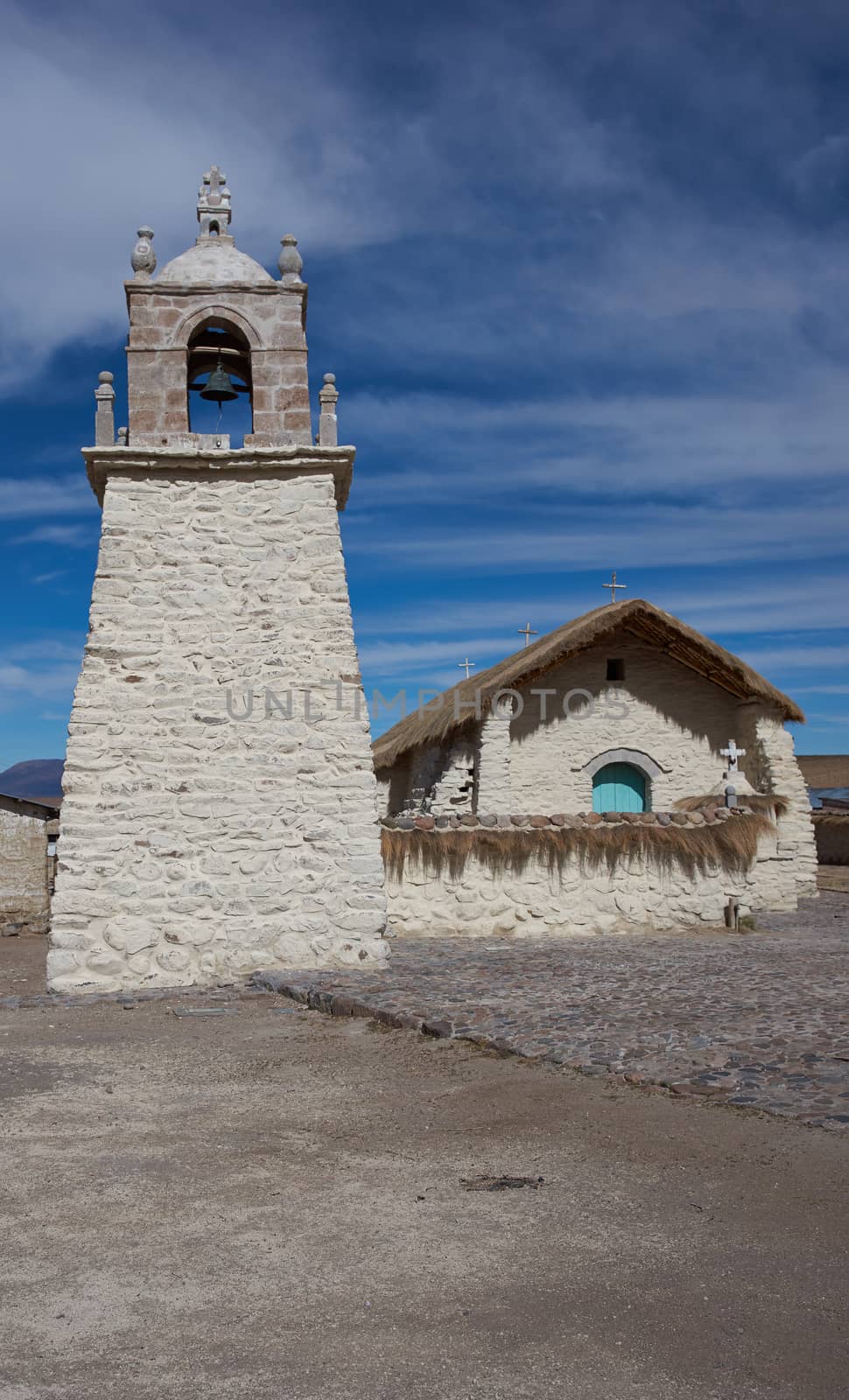 Historic church in the small village of Guallatire on the Altiplano in the Arica y Parinacota Region of Chile. The village sits at the base of the active Guallatire Volcano.