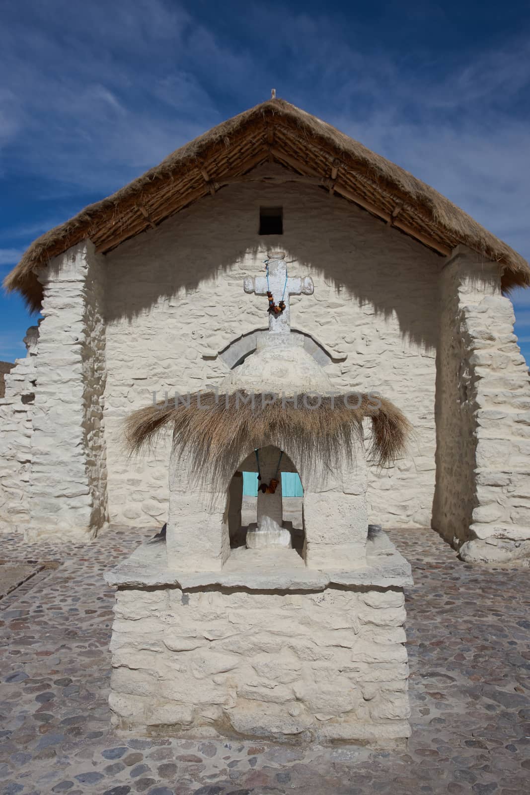 Historic church in the small village of Guallatire on the Altiplano in the Arica y Parinacota Region of Chile. The village sits at the base of the active Guallatire Volcano.