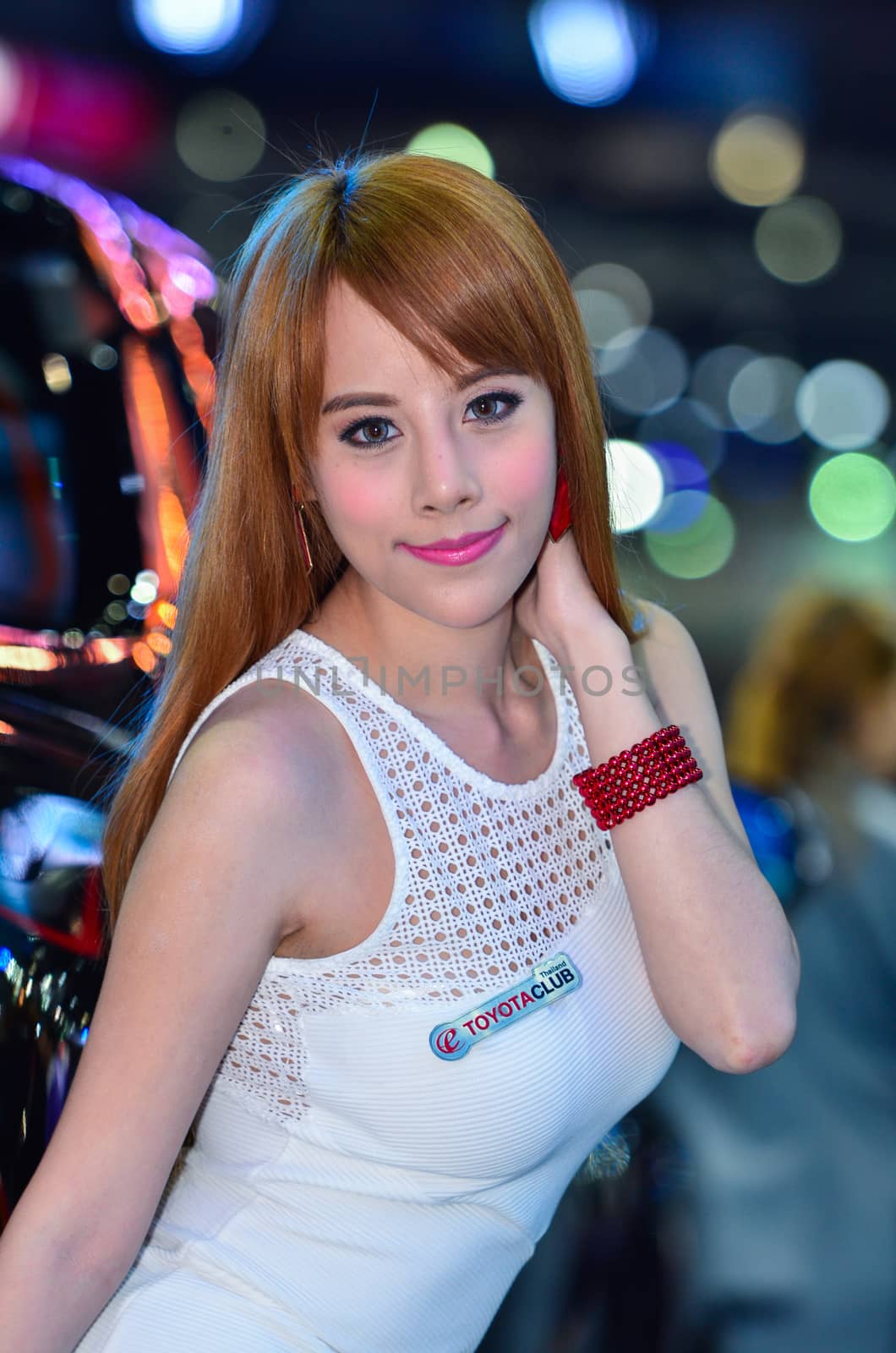 NONTHABURI - MARCH 26 : Unidentified model with Isuzu Pick up car on display at The 37th Bangkok International Thailand Motor Show 2016 on March 26, 2016 Nonthaburi, Thailand.