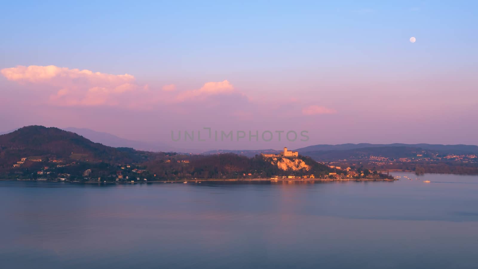 Fortress of Angera (Rocca di Angera), view from Arona at sunset, lake Maggiore,Italy.