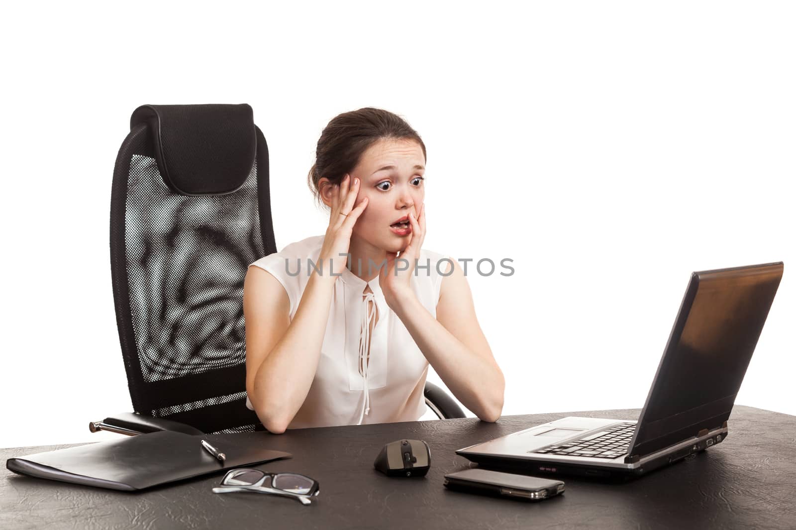 the business woman sits at office table with the laptop