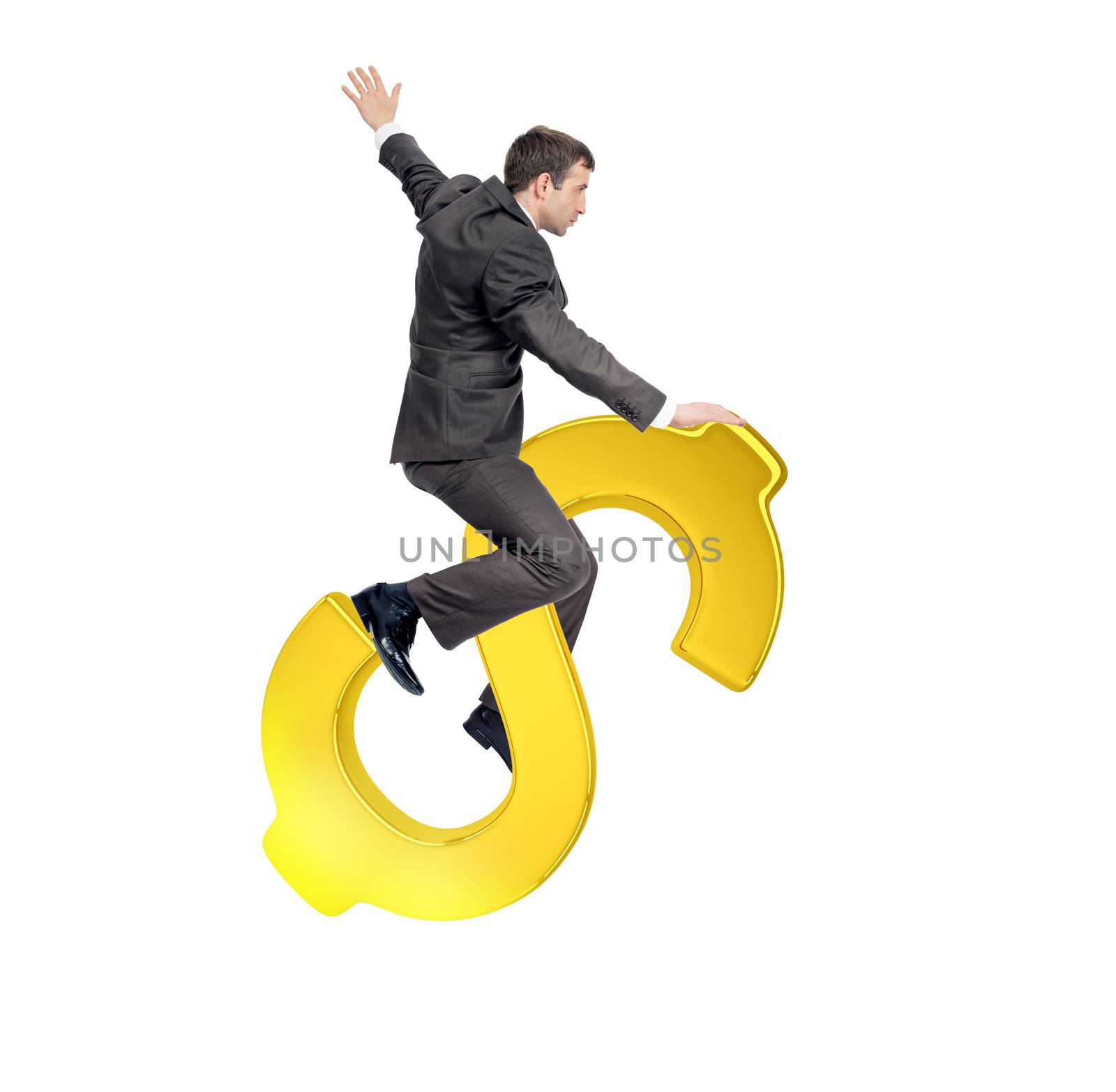 Businessman riding golden dollar sign isolated on white background