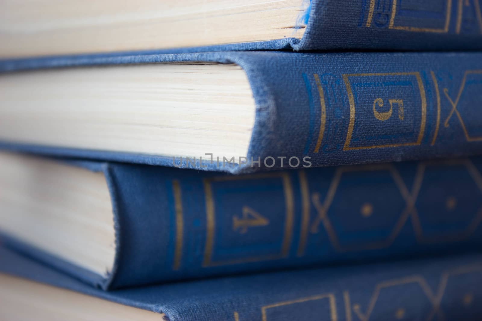 stack of books on the wooden table