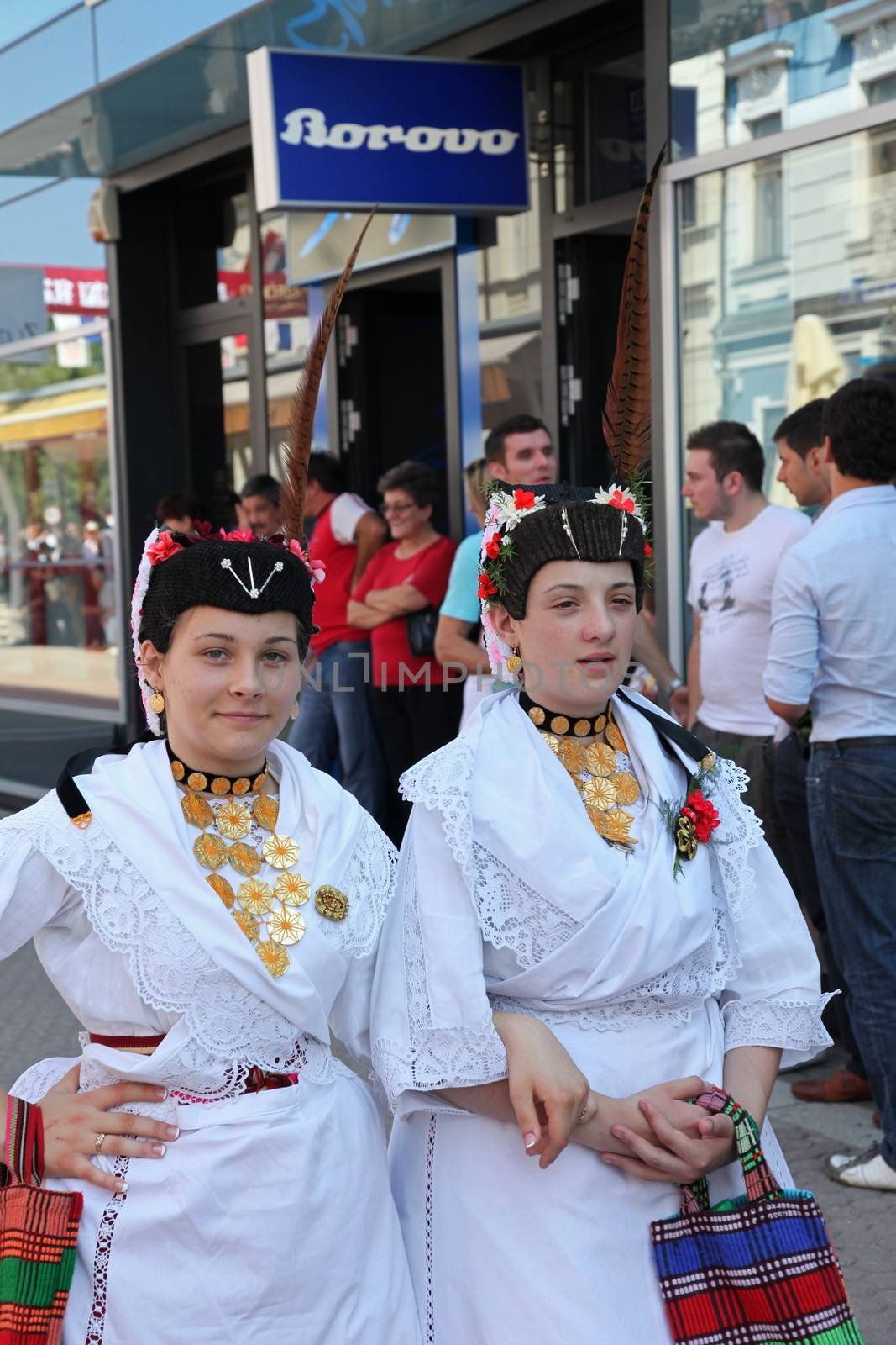 Croatian national costume from the village Gudinci, during the Dakovacki vezovi (Dakovo Summer Festival) on July 05, 2009 in Dakovo, Croatia.