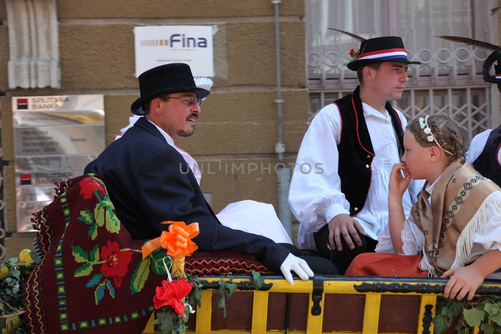 Croatian national costume at the horse and wedding wagon show during Dakovo vezovi (Dakovo Summer Festival) on July 05, 2009 in Dakovo, Croatia.