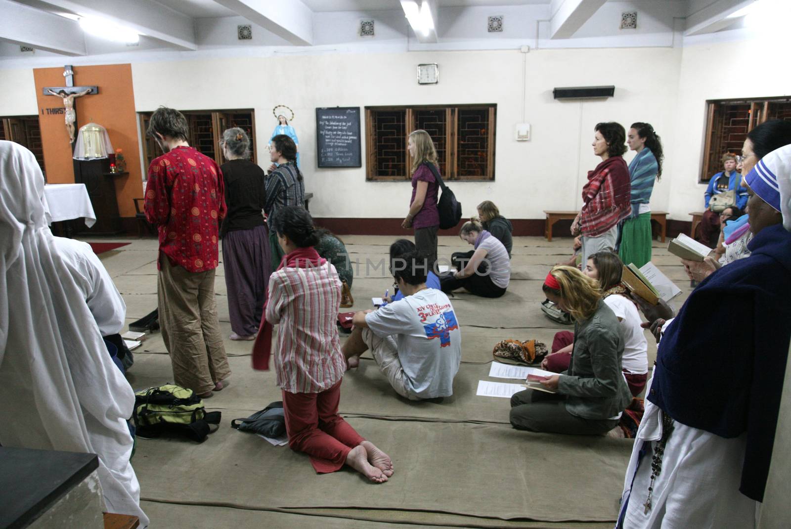 Sisters of The Missionaries of Charity of Mother Teresa at Mass in the chapel of the Mother House, Kolkata, India