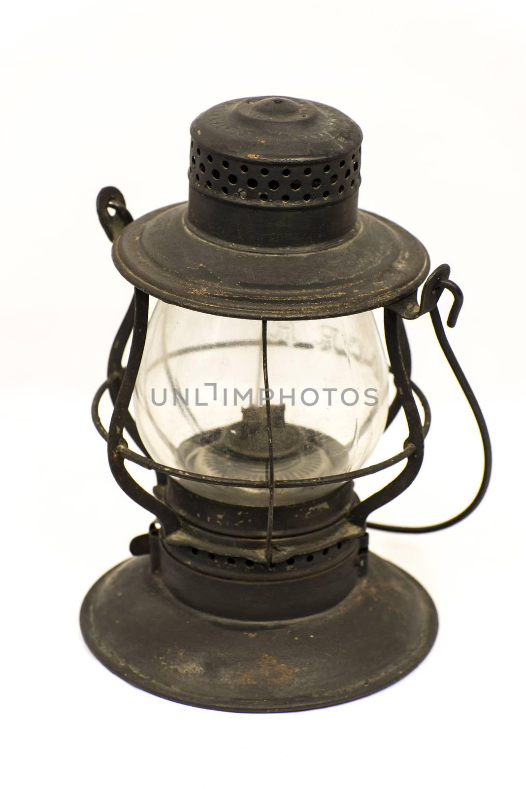 Old oil lantern isolated on white background