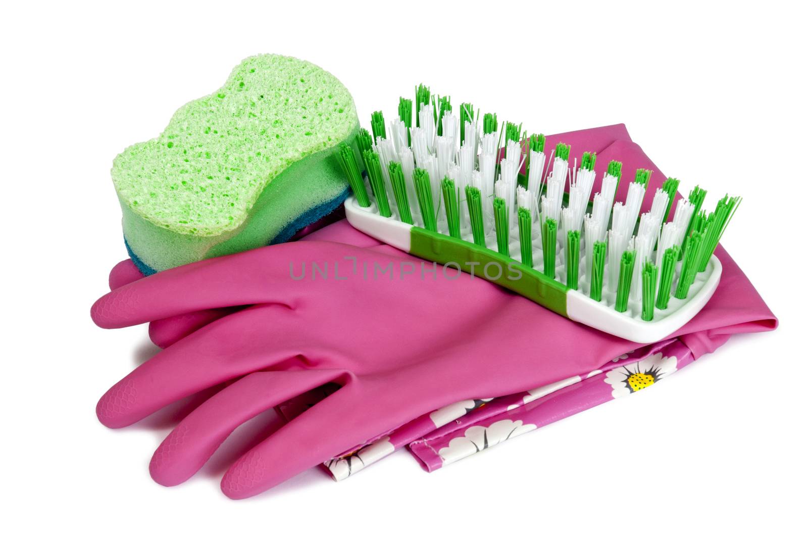 Rubber gloves with sponge and brush ready for cleaning the household
