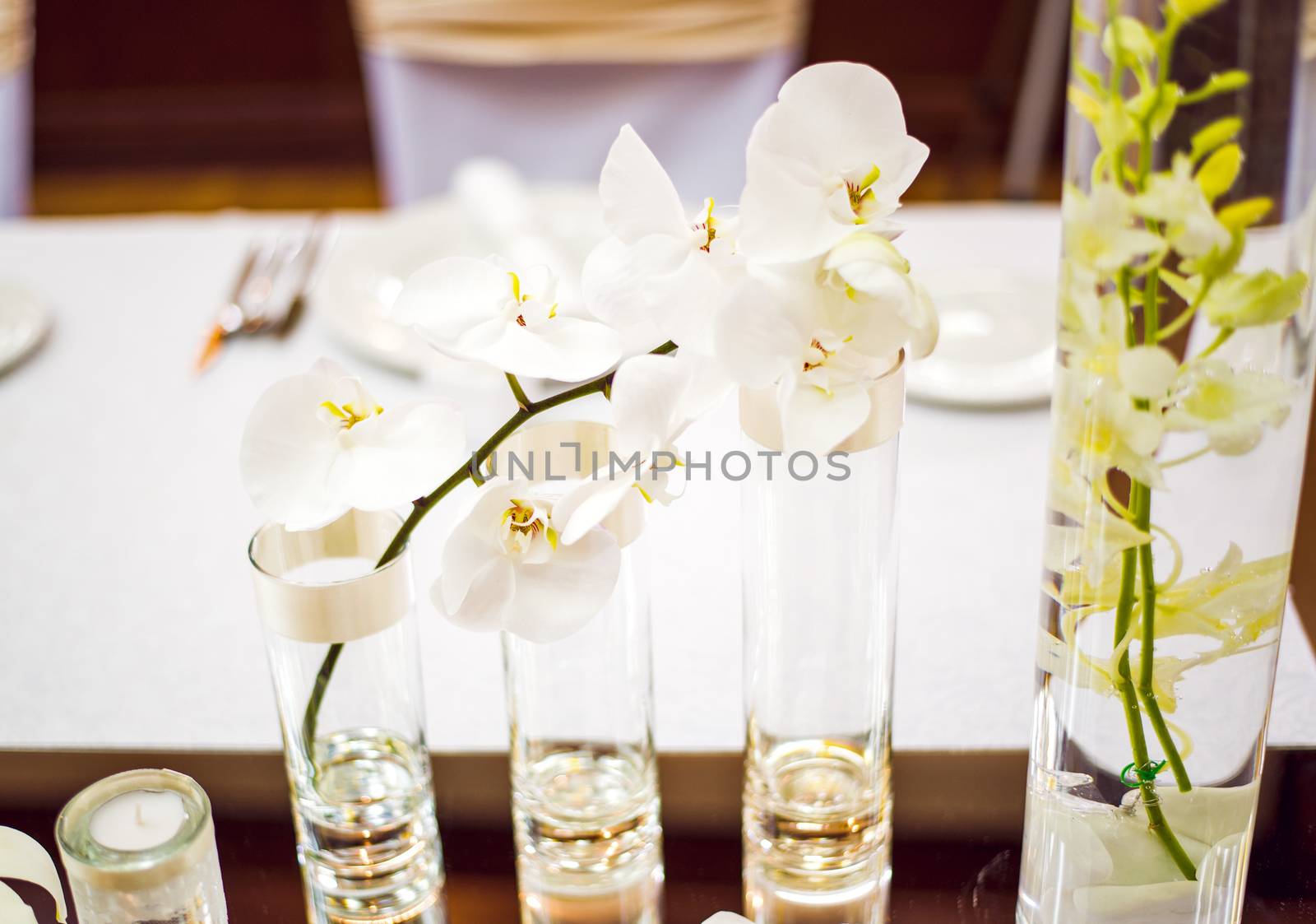 Wedding table decoration with Orchid and glassware