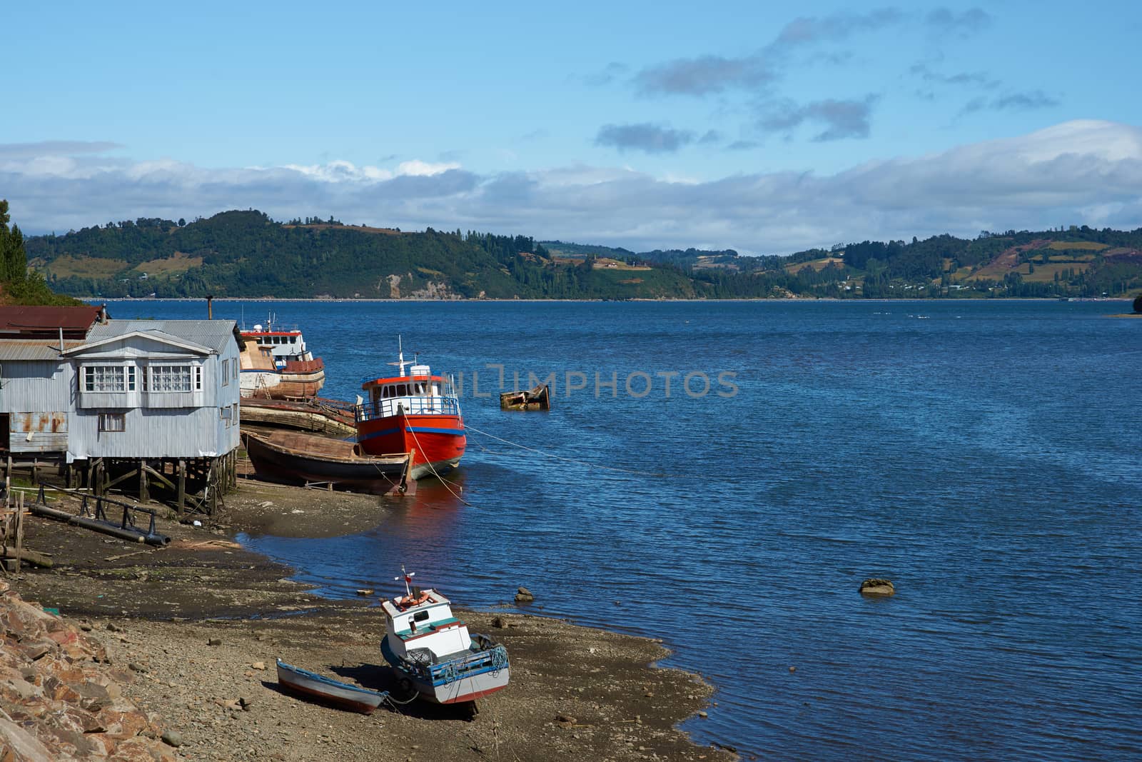 Fishing boats on the coast in Castro, capital of the Island of Chiloé in Chile.
