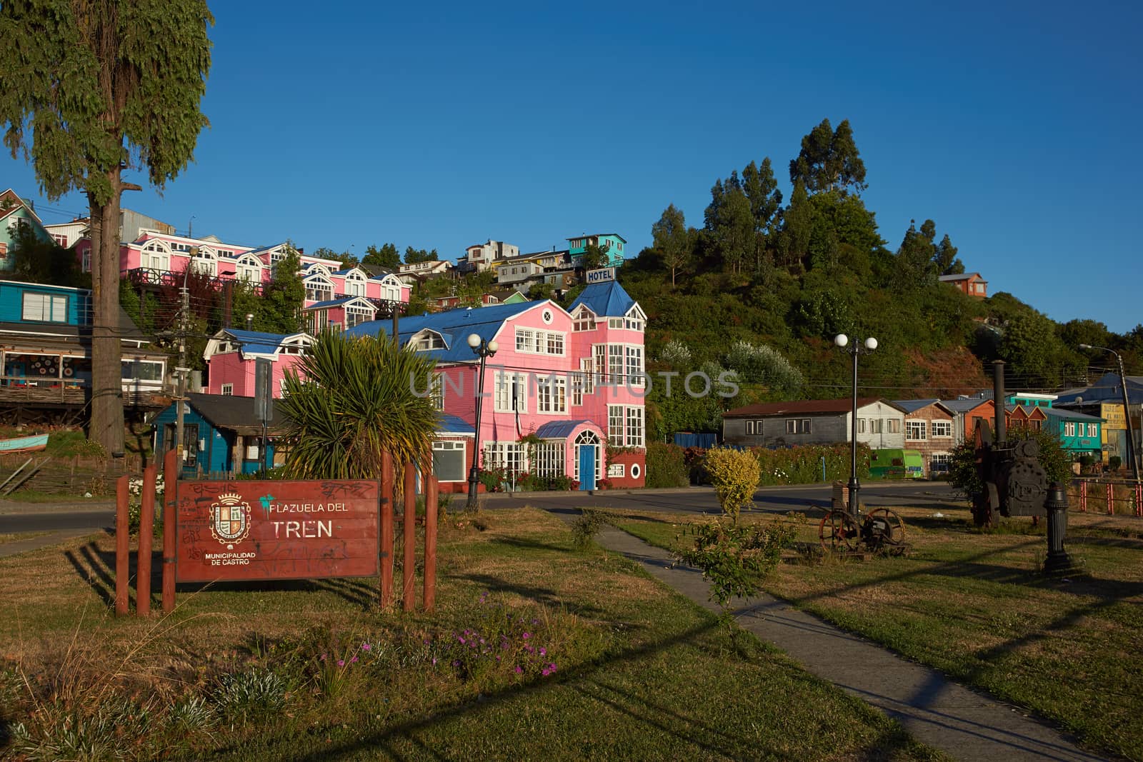 Colourful buildings overlooking the coast in Castro, capital of the Island of Chiloe in souther Chile.