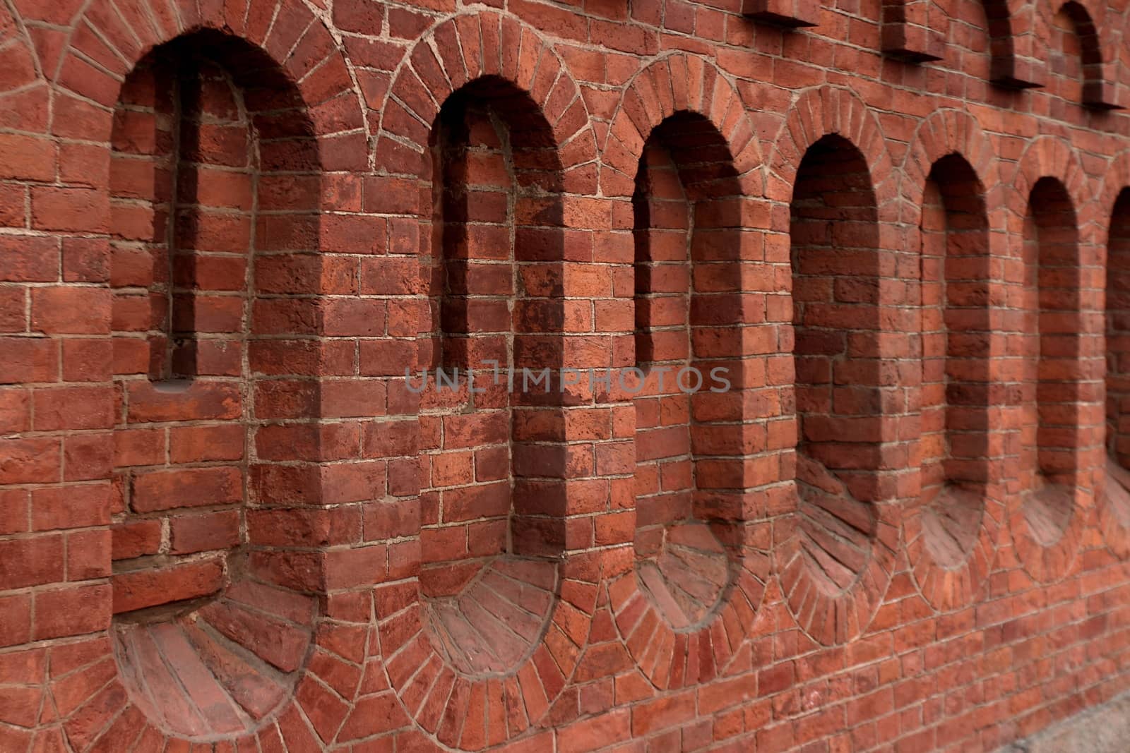 red brick fortress wall background close to