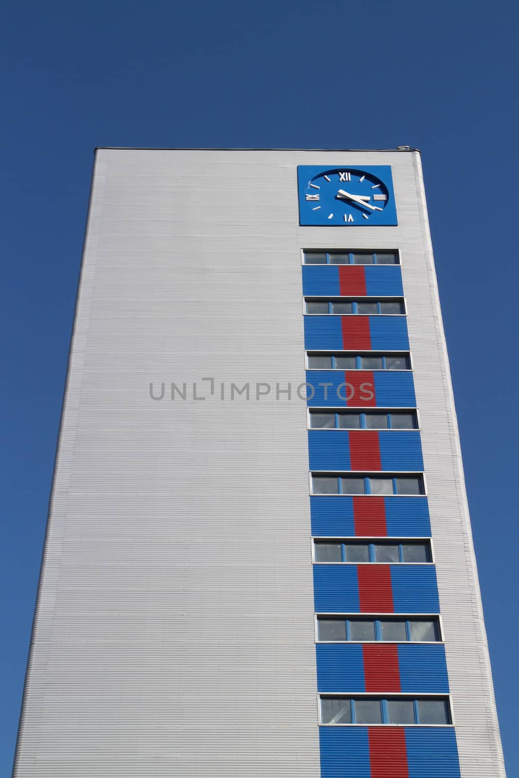 blue clock tower on a blue background