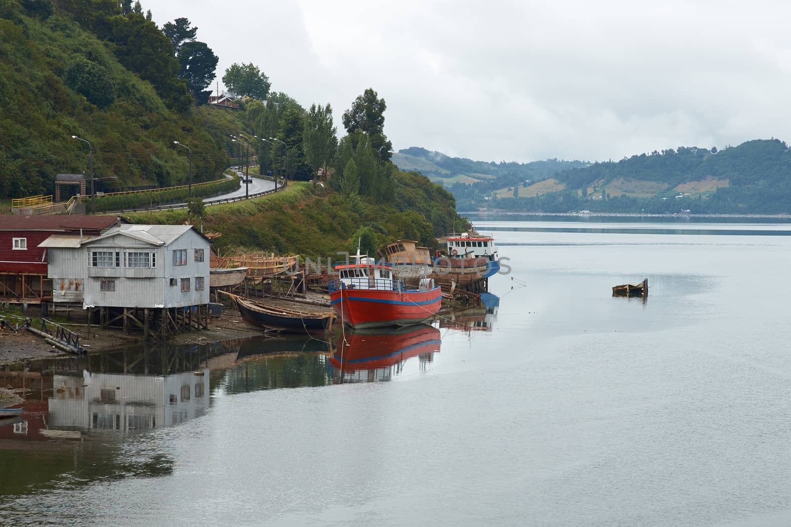 Palafitos. Traditional wooden houses built on stilts along the waters edge in Castro, capital of the Island of Chiloe. These traditional houses are made of wood and usually painted in bright colours.