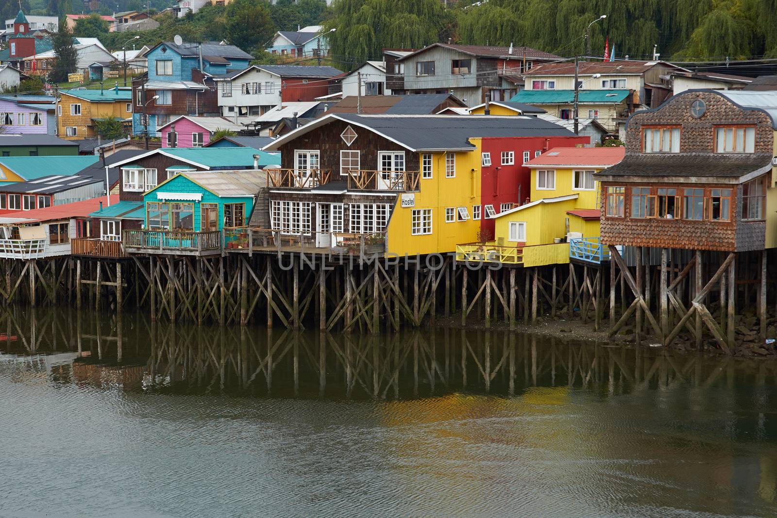 Palafitos. Traditional wooden houses built on stilts along the waters edge in Castro, capital of the Island of Chiloe. These traditional houses are made of wood and usually painted in bright colours.