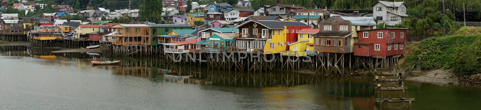 Palafitos. Traditional wooden houses built on stilts along the waters edge in Castro, capital of the Island of Chiloe. These traditional houses are made of wood and usually painted in bright colours.