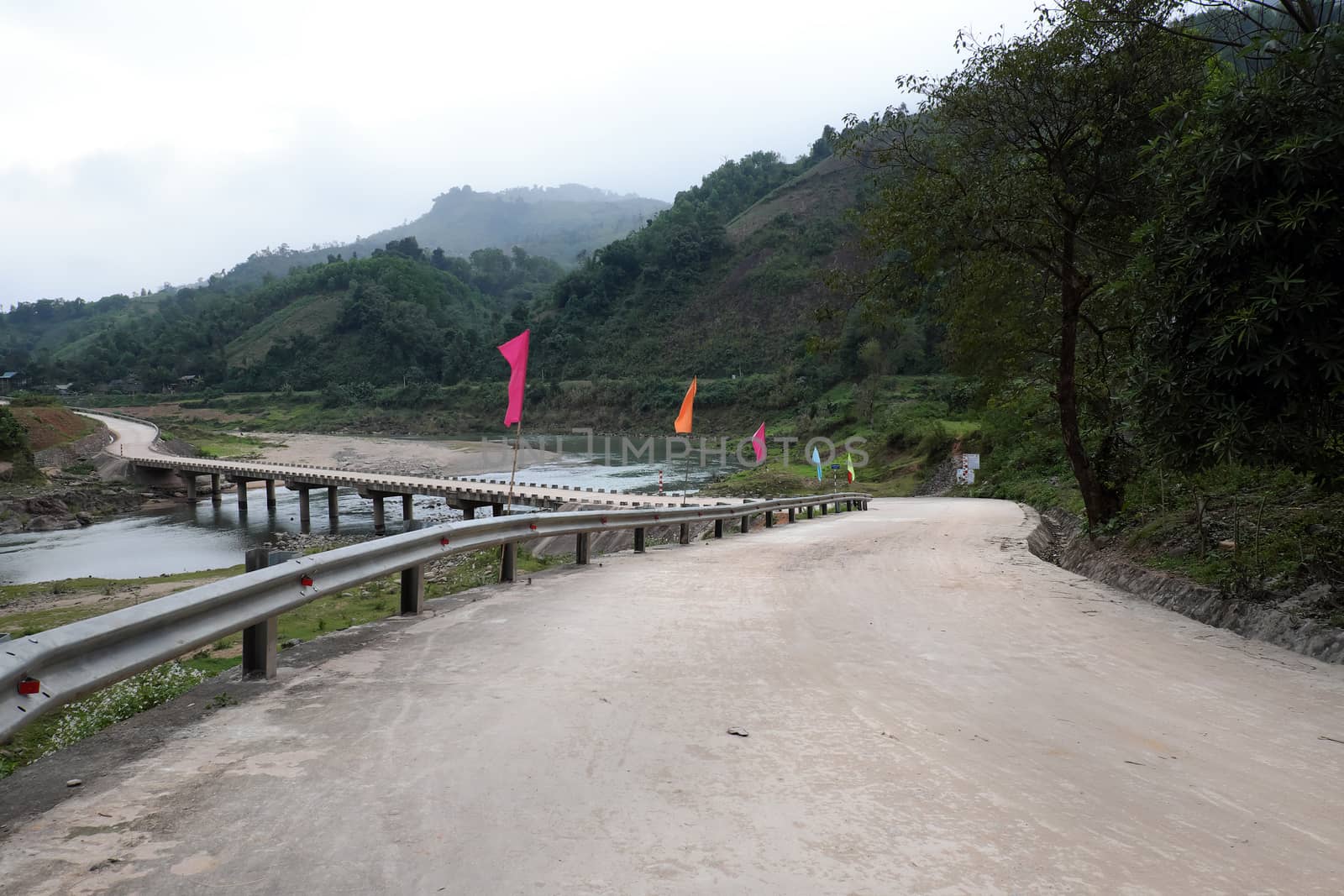 Group of house in ethnic minority residence at Quang Nam village, along Ho Chi Minh trail, houses on mountain terrain, stay seperation in fresh air, green scene on day