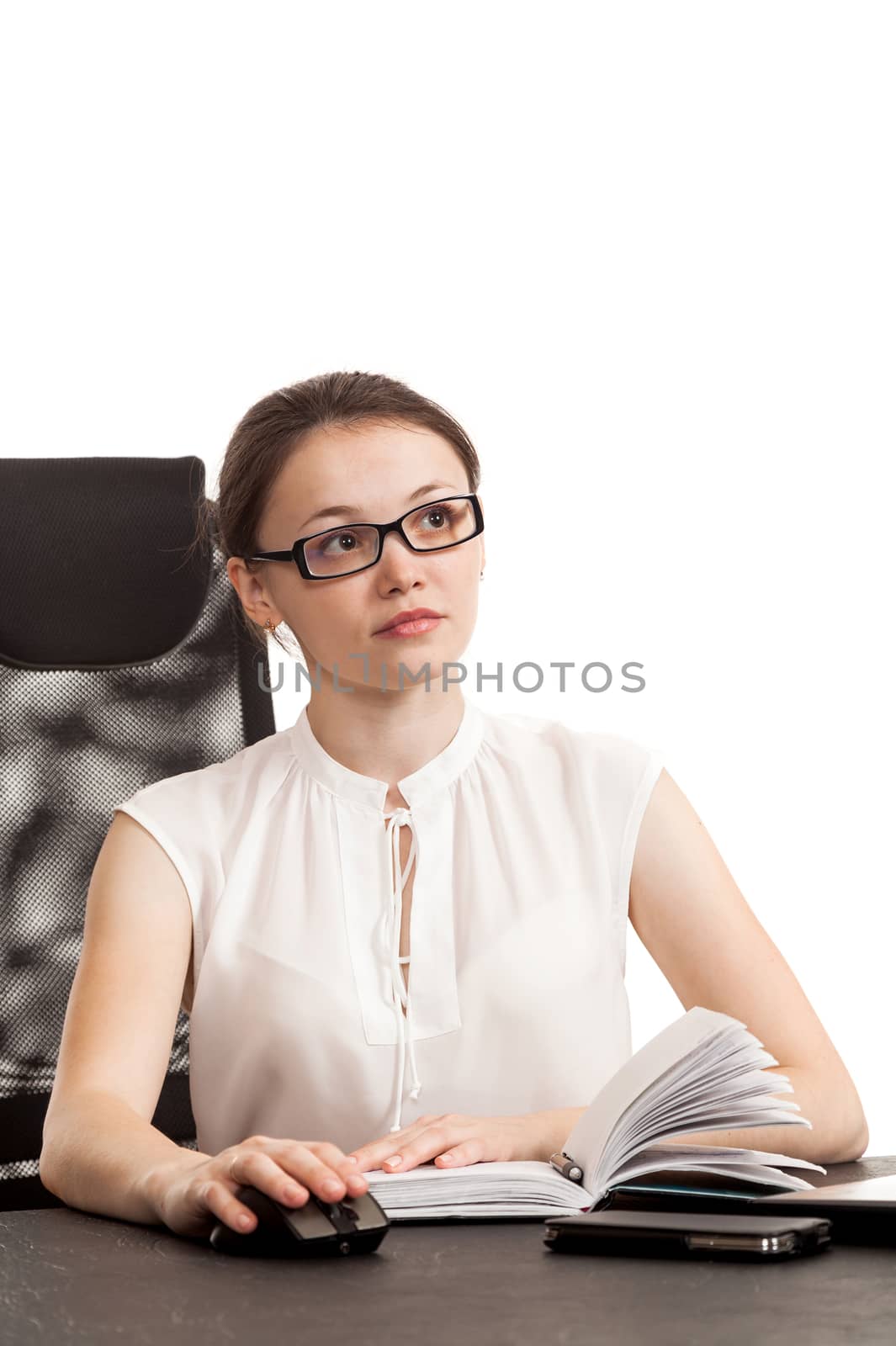 the business woman sits at office table with the laptop