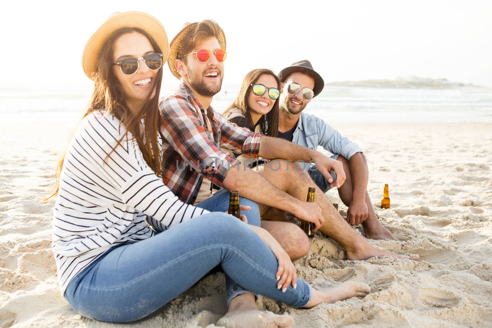 Friends at the beach enjoying the summer