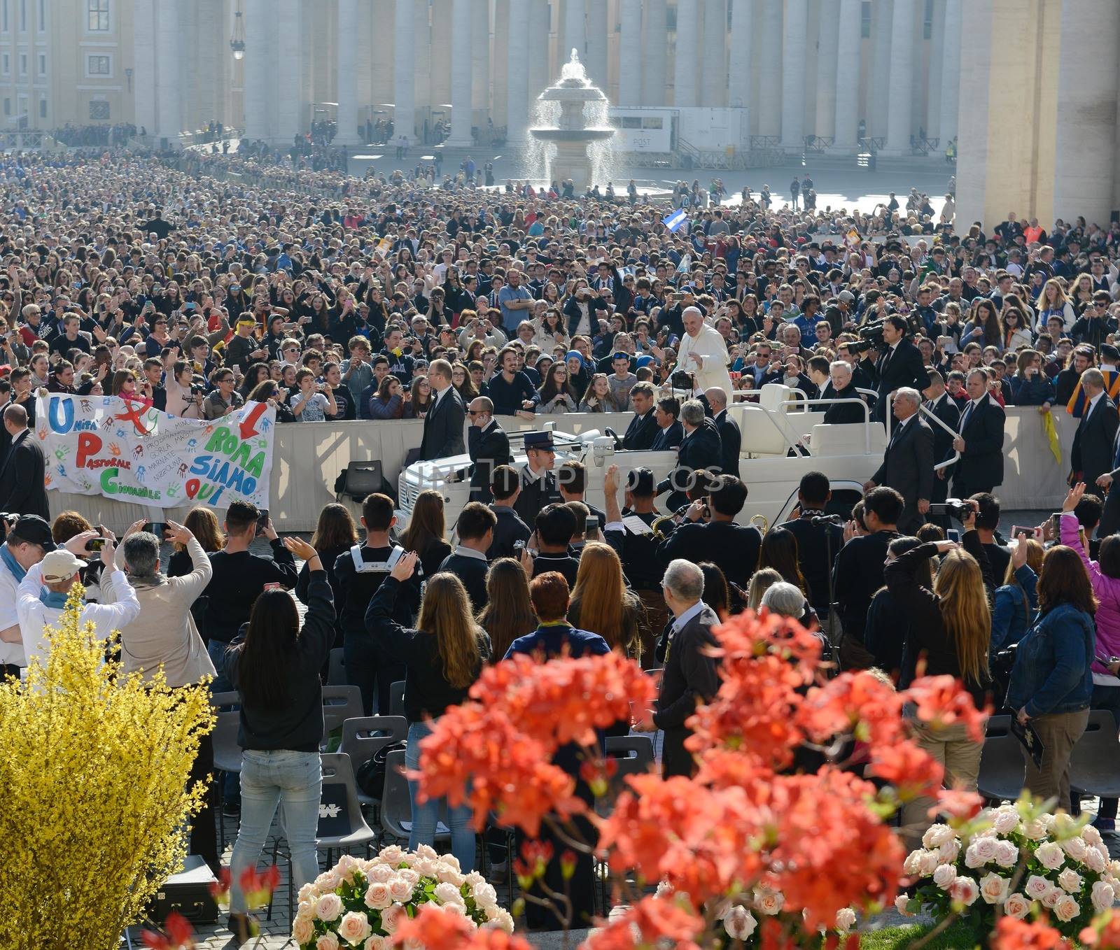 VATICAN: Pope Francis greets the crowd from the popemobile during his weekly general audience at St Peter's square on March 30, 2016, at the Vatican.