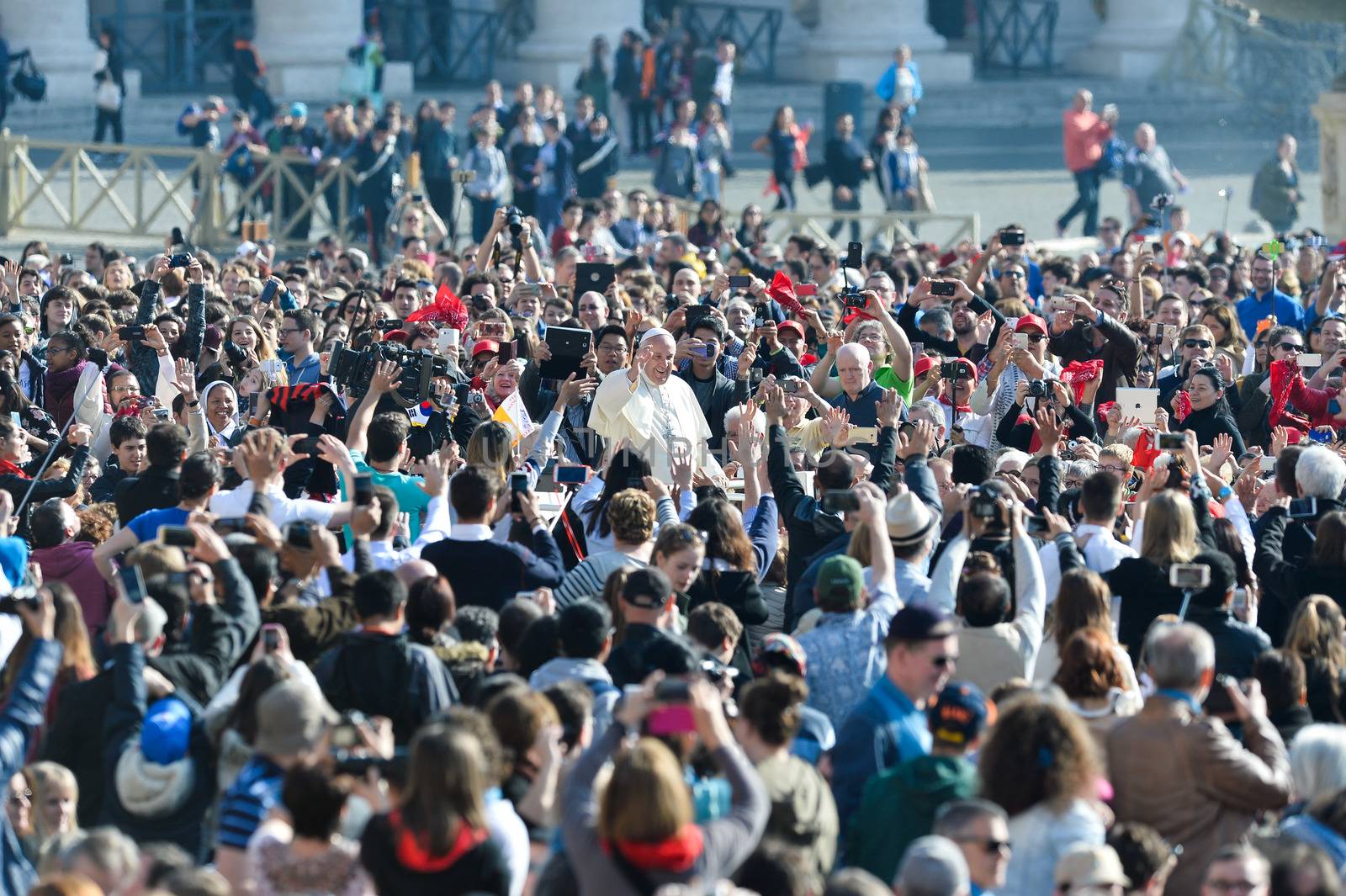 VATICAN: Pope Francis greets the crowd from the popemobile during his weekly general audience at St Peter's square on March 30, 2016, at the Vatican.
