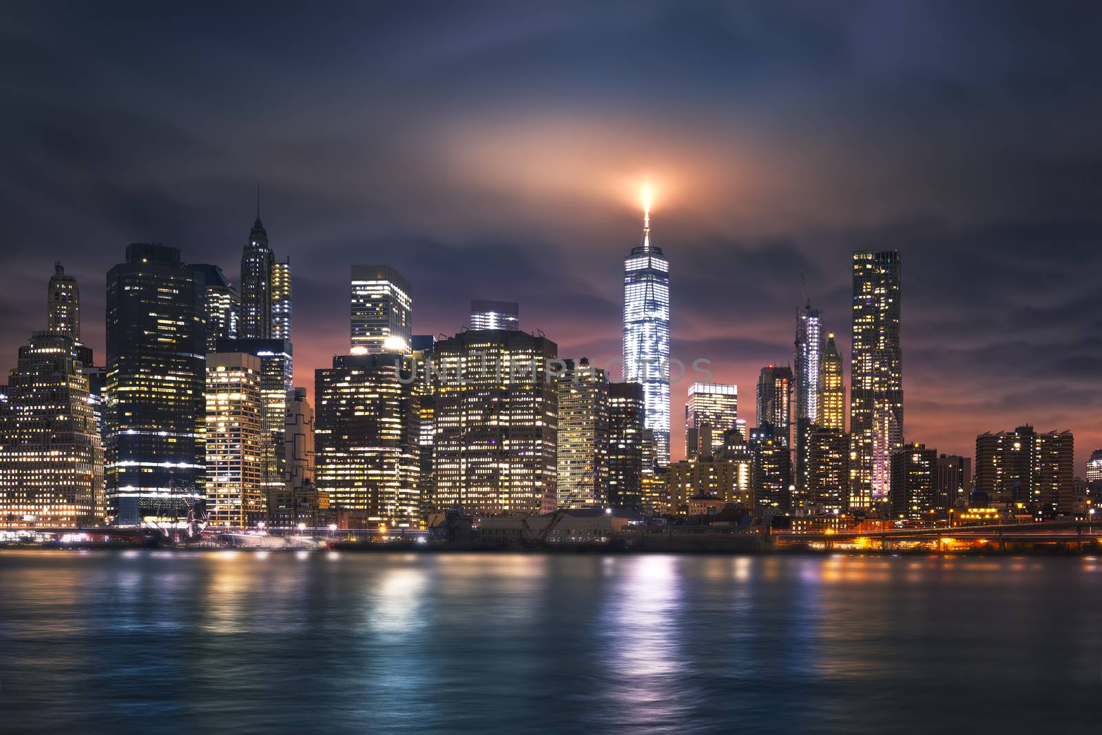 New York City - beautiful sunrise over manhattan with manhattan and brooklyn bridge USA