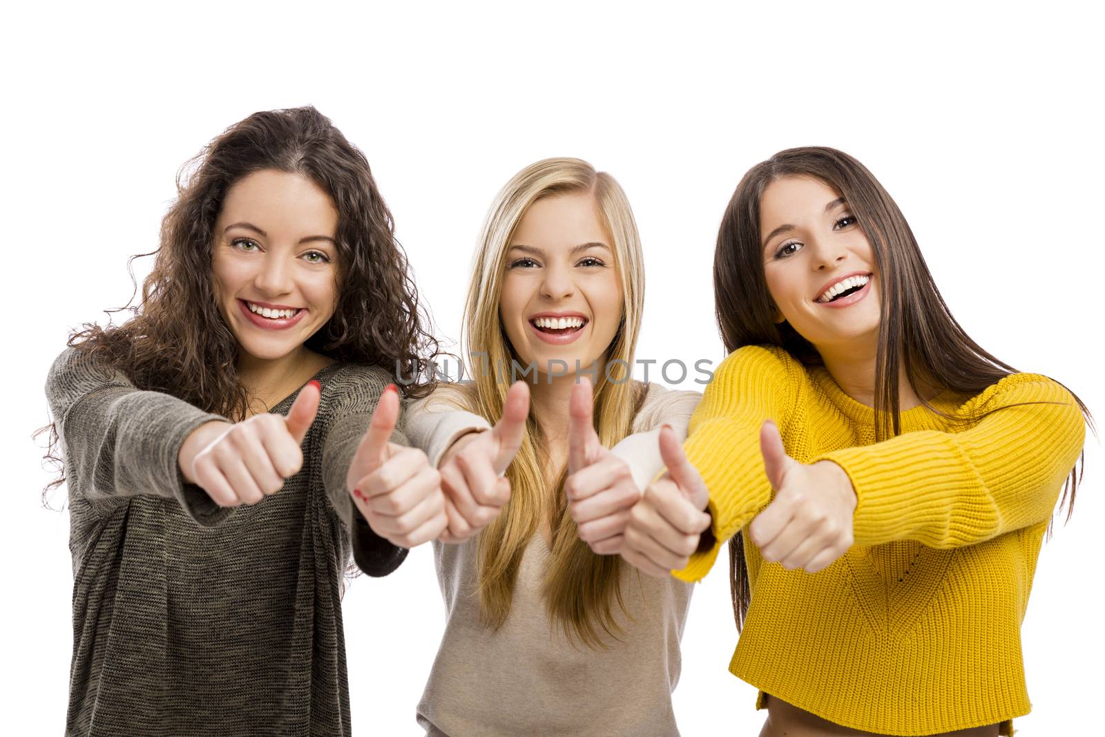 Group of teenage friends with thumbs up