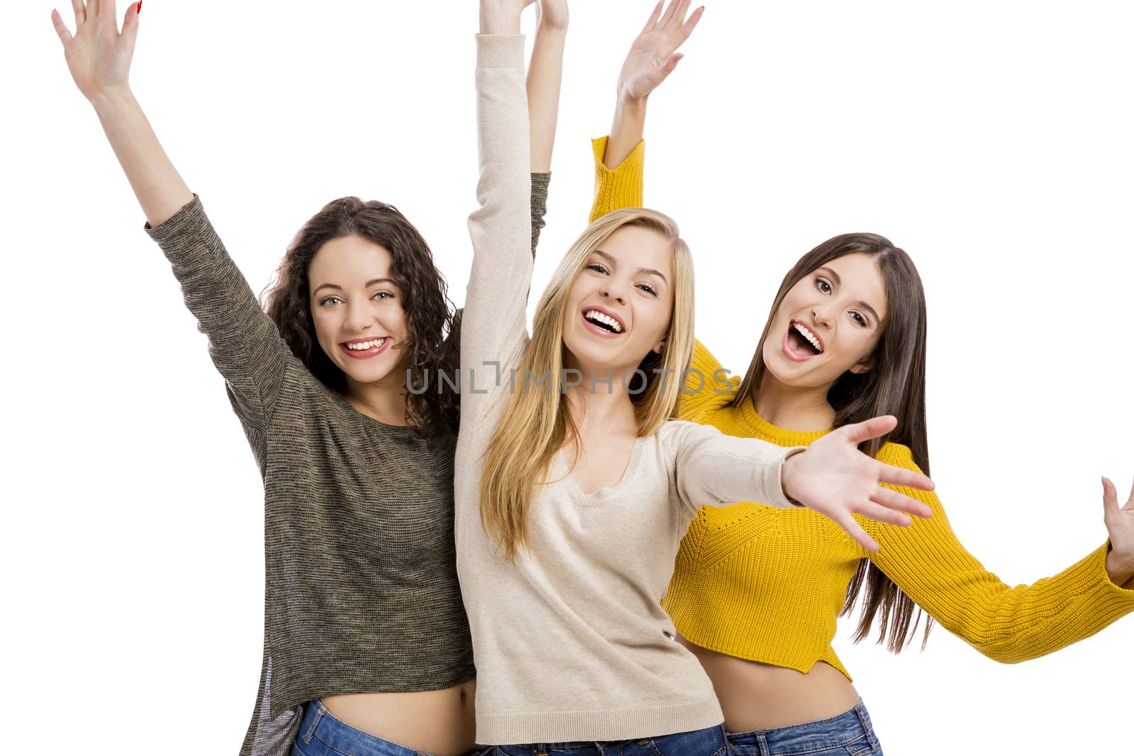 Group of teenage friends with arms open