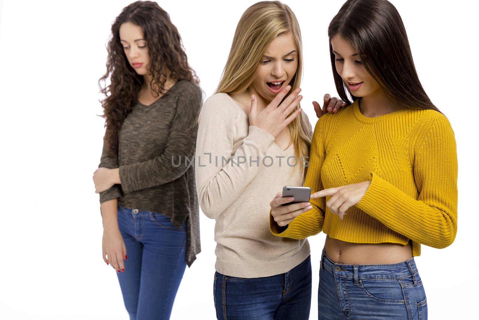 Teenagers making gossip from other girl