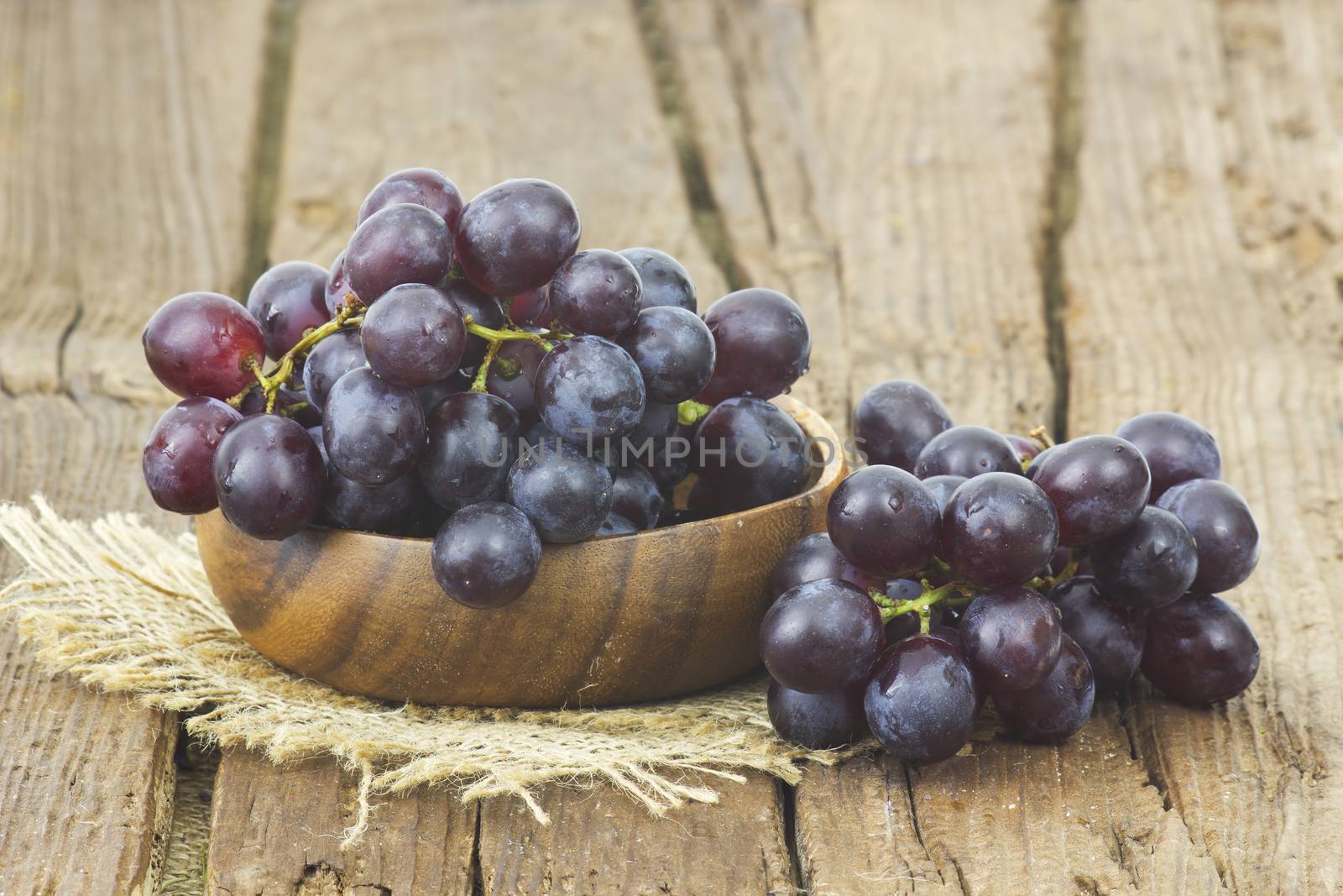 grapes in a bowl by miradrozdowski