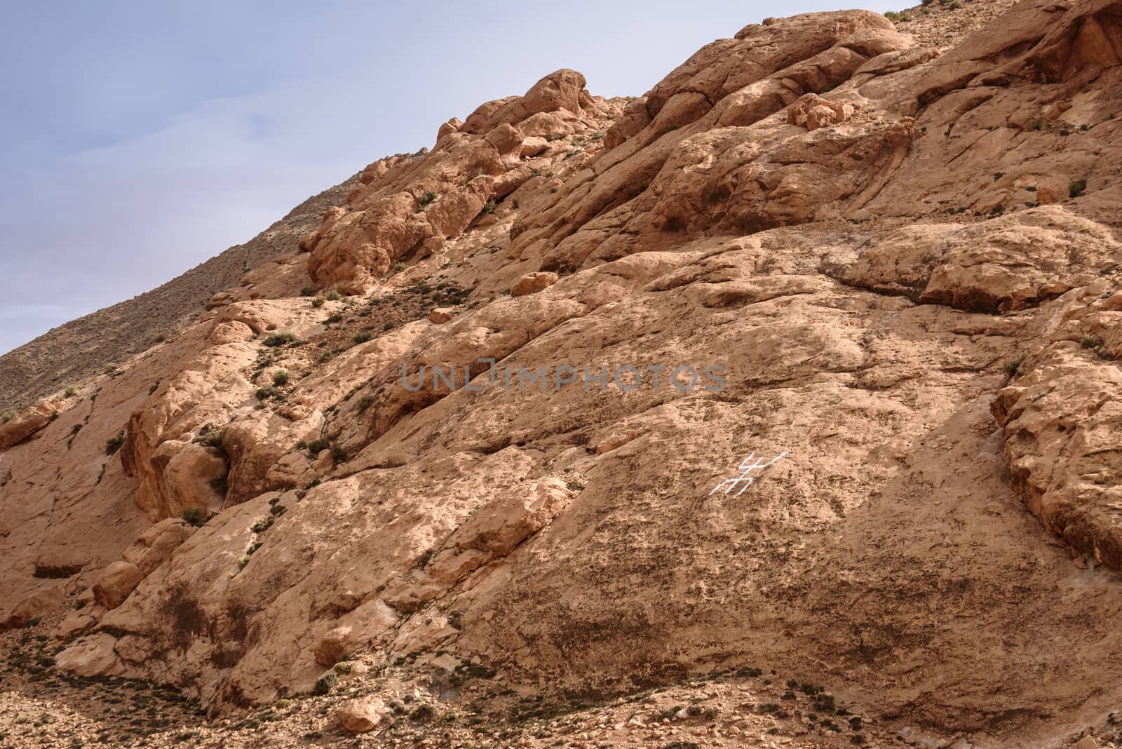 Berber Sign on the rock in Atlas Mountains, Morocco by johnnychaos