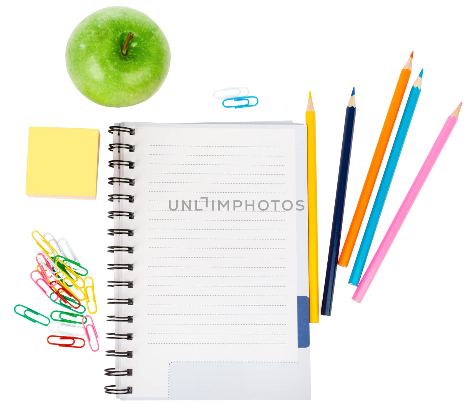 Open notebook with stationery and apple by cherezoff