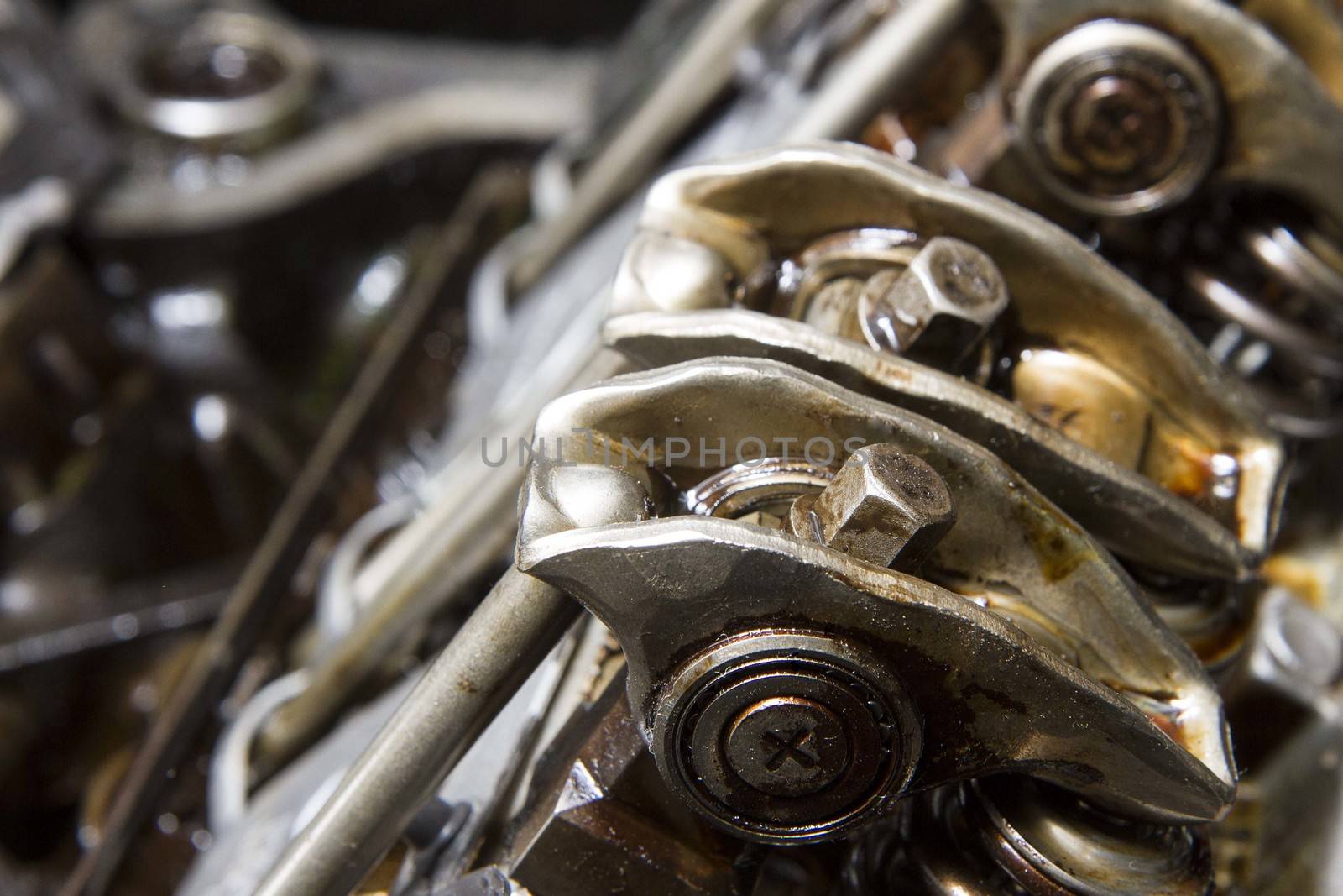 Rockar arms and push rods of an engine being repaired