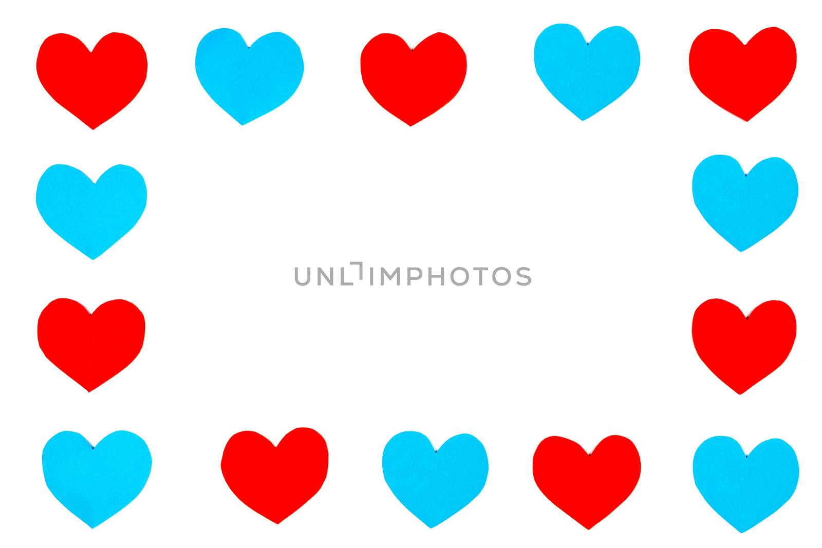 Frame of red and blue paper hearts with white isolated copy space