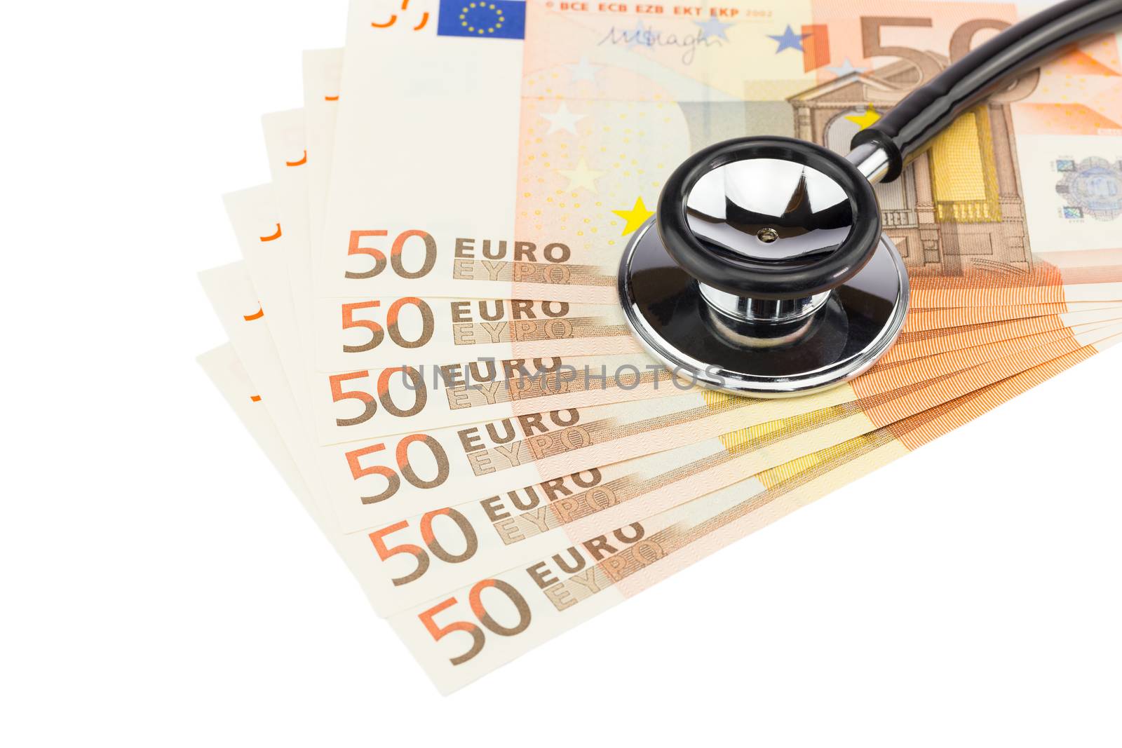 Part of professional stethoscope on euro bills isolated on white background