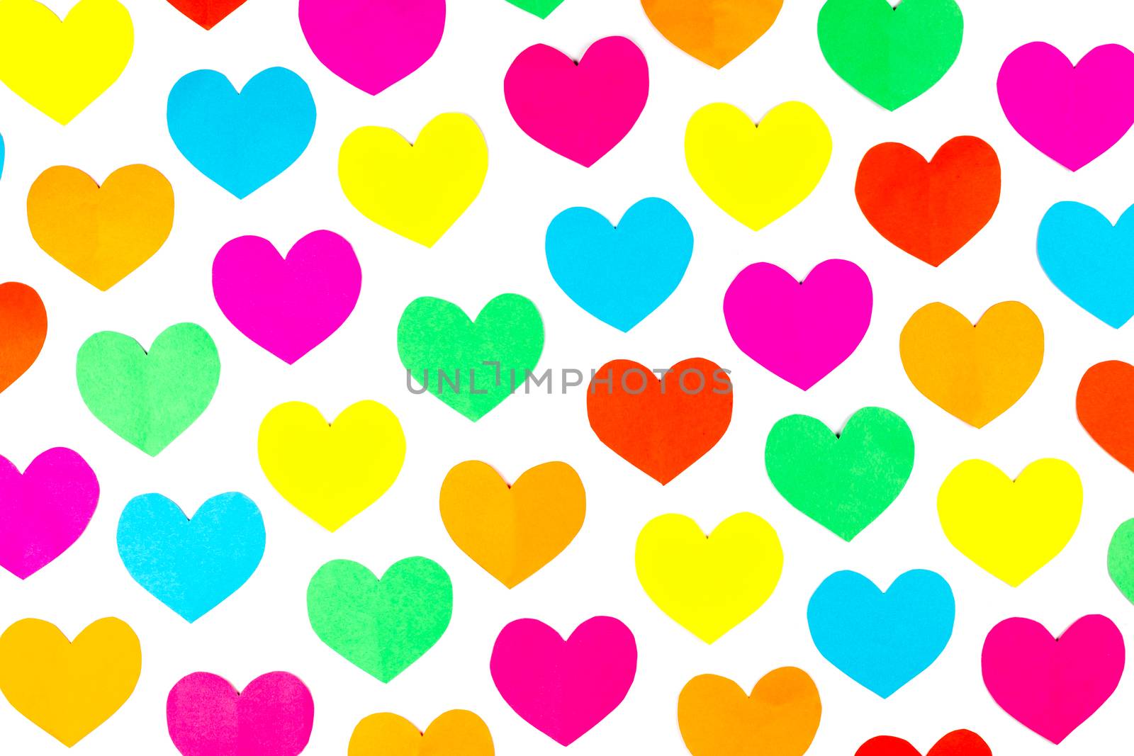 Rows of different colored  paper hearts isolated on white background