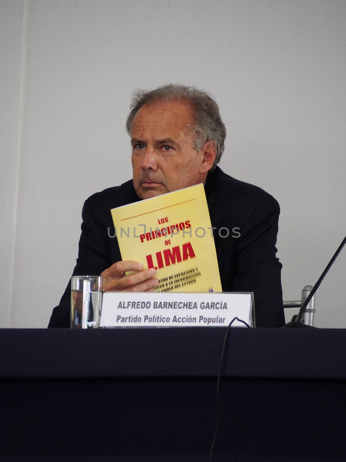 PERU, Lima: Popular Action party candidate Alfredo Barnechea Garcia holds a speech during the Forum for Freedom of press, Transparency and Right to Information, in Lima, Peru, on March 30, 2016. During this event,  main presidential candidates are invited to sign the Lima Principios agreement, which guarantee freedom of press, but Order party candidate Antero Flores-Araoz refused to sign. Peru will go to the polls to elect a new president on April 10. 