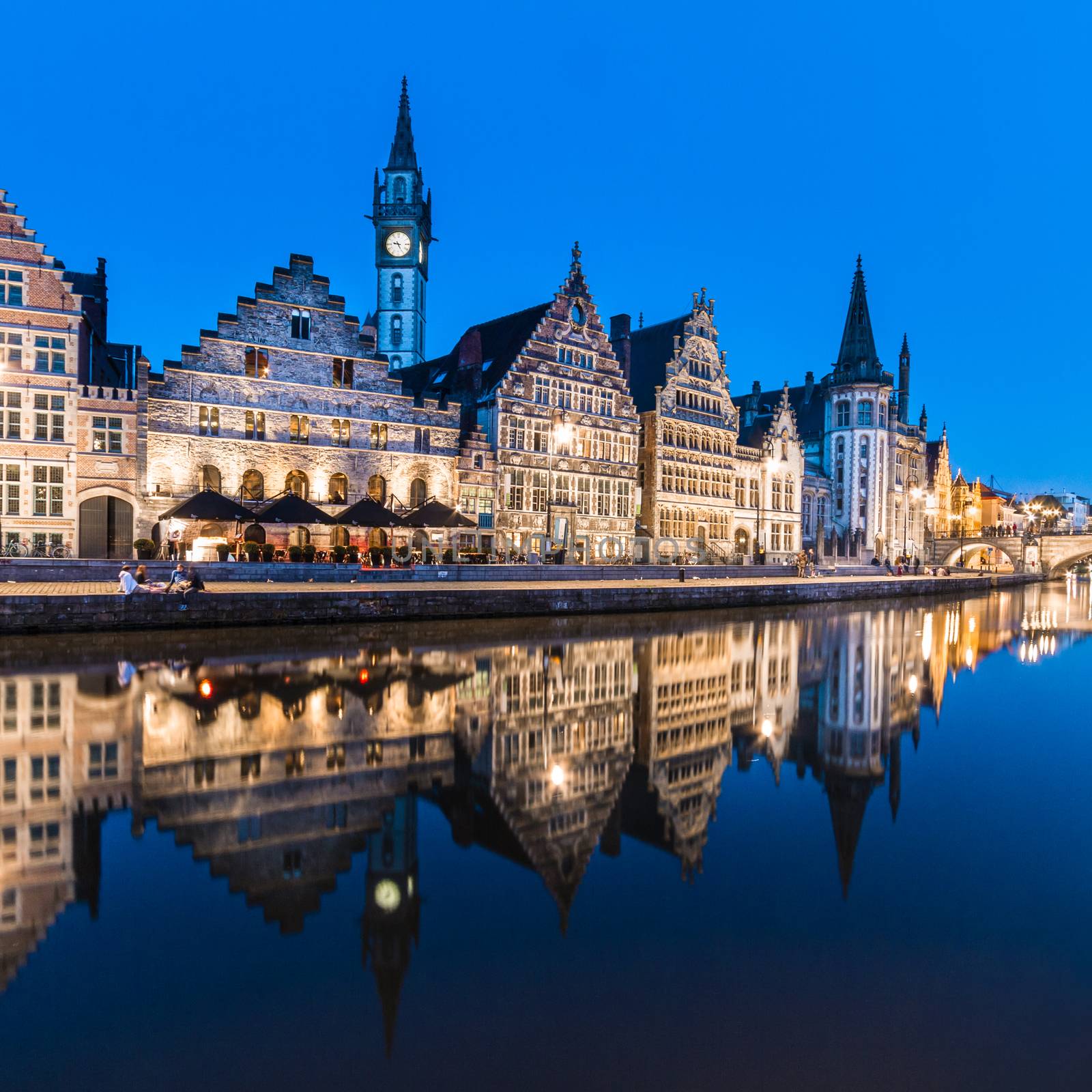 Picturesque medieval buildings overlooking the "Graslei harbor" on Leie river in Ghent town, Belgium, Europe.