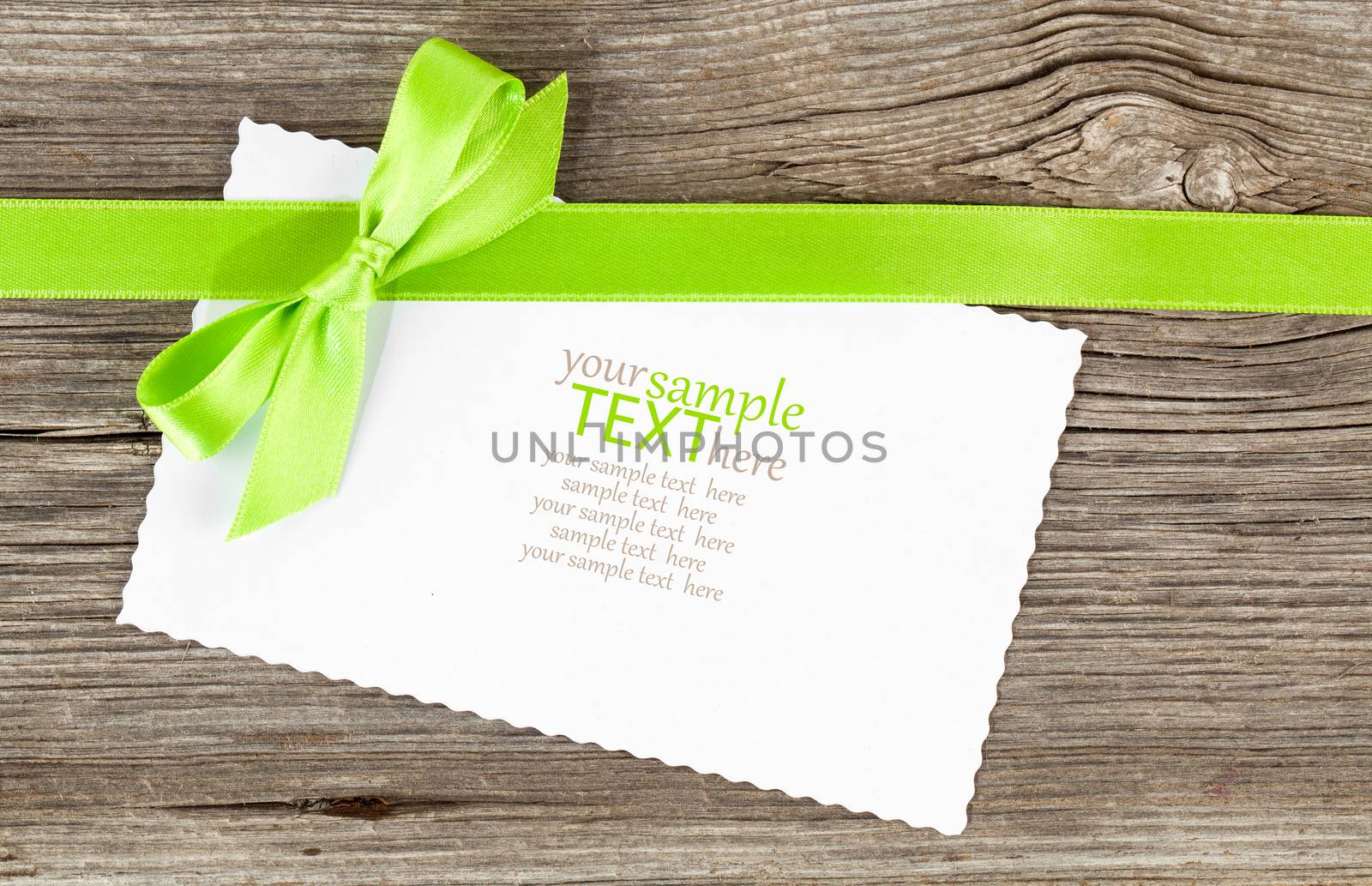 holiday background with green bow and empty paper blank, on old  by motorolka