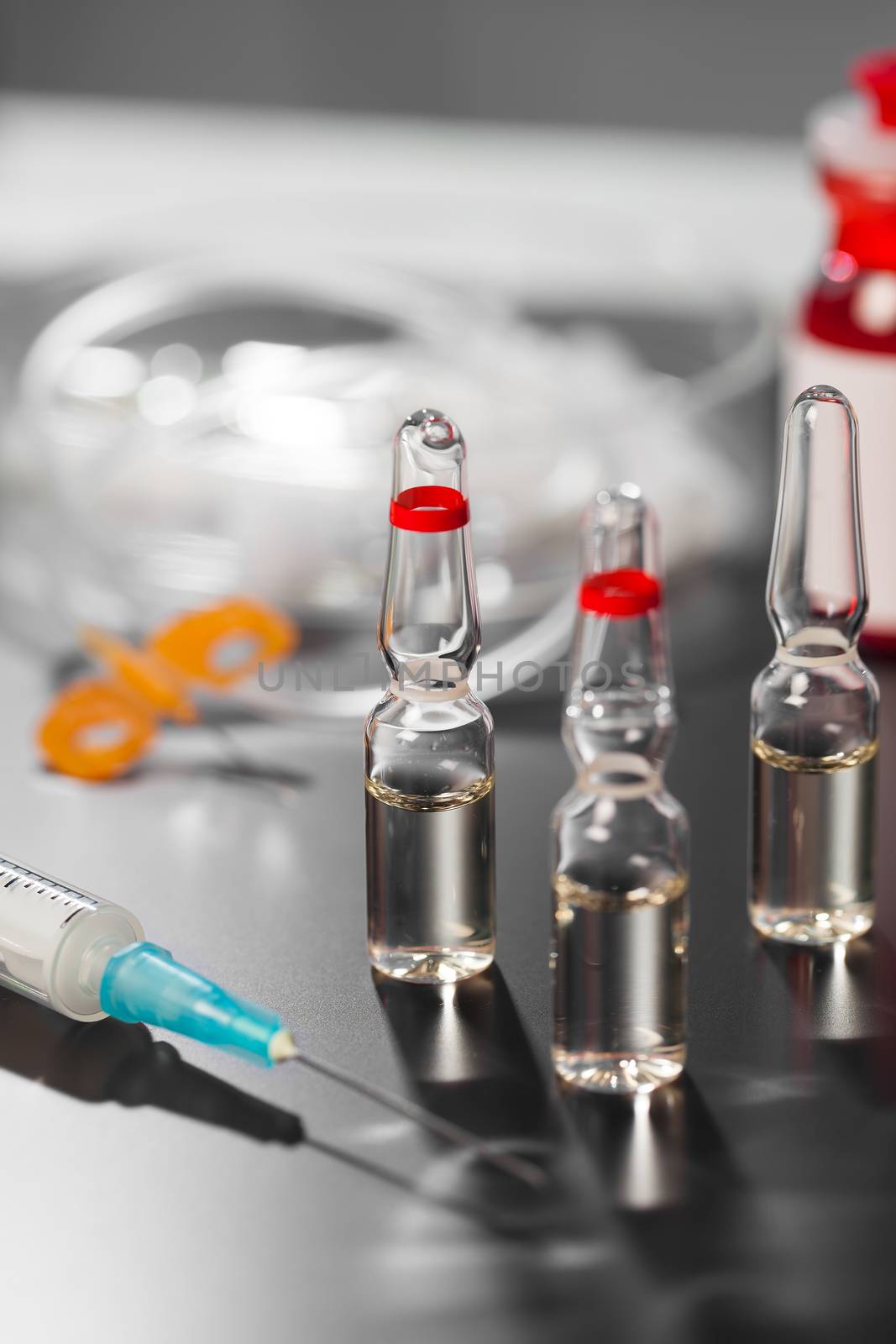 medical ampoules and syringe  by motorolka