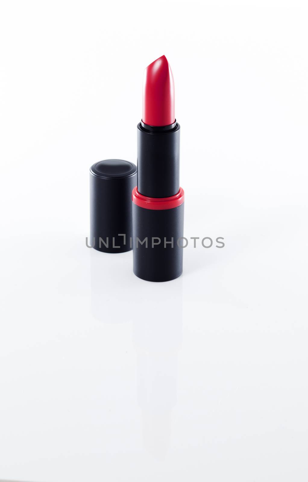 red lipstick isolated on white background