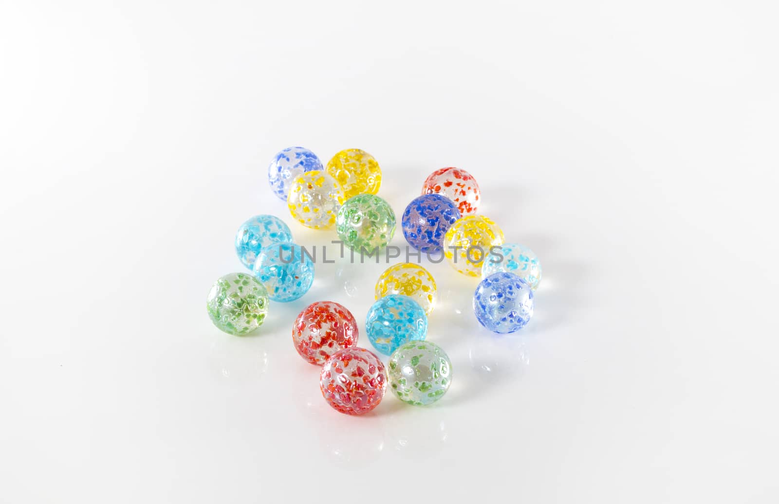 coloured marbles isolated on white background