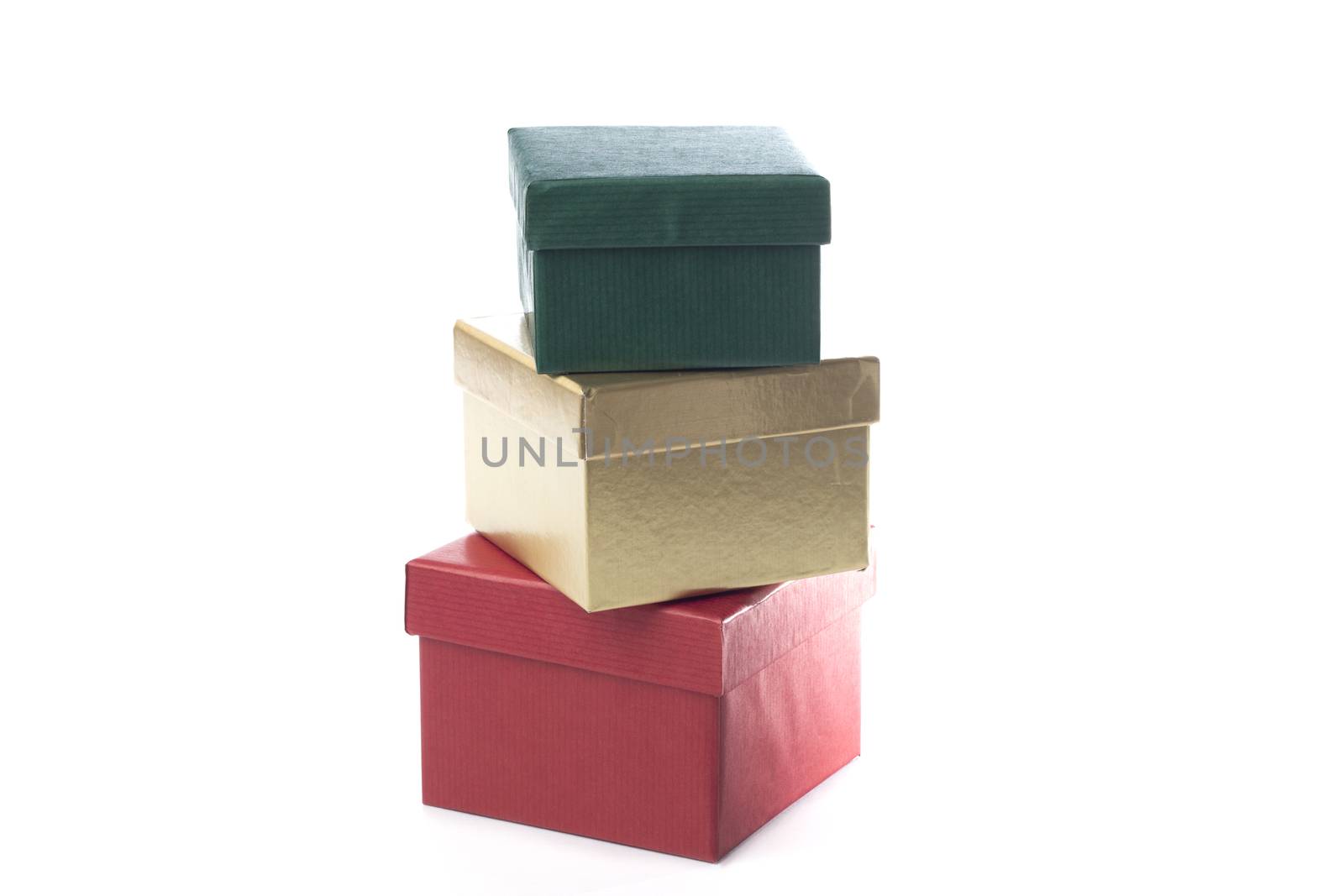 Green, gold and red giftboxes, isolated on white background