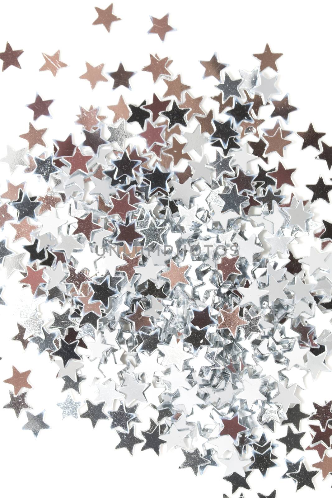 Golden and silver stars on white background